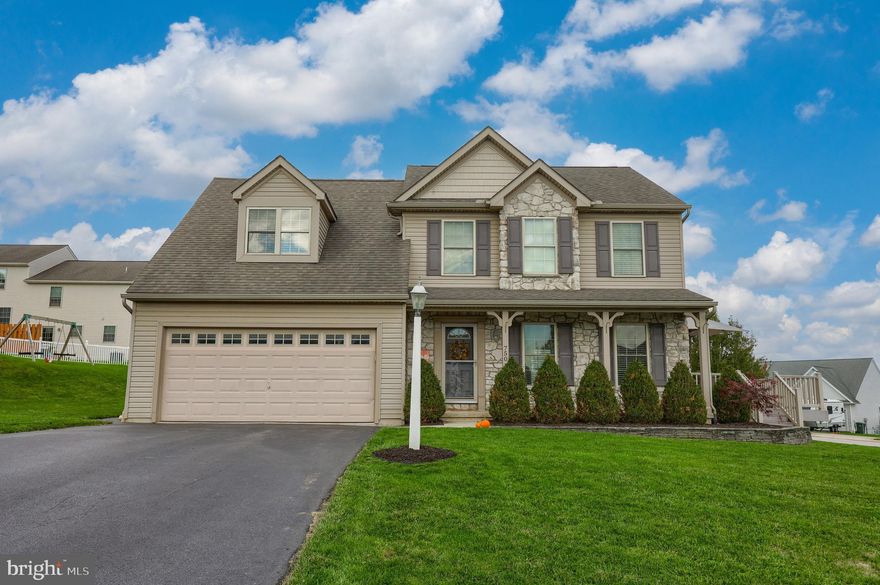 Outstanding, beautifully maintained, well designed 4 bedroom, 2 full bath, 2 half bath that will impress you from the moment you drive up. As you step into the home from the covered front porch, which offers views of the countryside, you will not be disappointed. The interior of the home offers an open flowing floor plan with bounds of natural light. The flooring throughout the first floor is hardwood that is carried from the living room into the dining area and eat in kitchen. The home has been all freshly painted. The dining room offers patio doors to a maintenance free, large deck that also allows you to enjoy the amazing and relaxing views of the area. A large eat in kitchen offers a center island, great cabinetry, and stainless steel appliances. There is a first floor powder room and laundry that opens out to a large, attached 2 car garage. The second floor features an oversized primary bedroom with an en suite bath with a walk in closet, separate shower, and jacuzzi tub. There are 3 additional lovely bedrooms that share a full bath with double sinks and tub/shower. The lower level is not to be missed. The lower level has been finished with the same quality as the rest of the home. This walk out lower level allows wonderful natural light through the windows and large patio doors to the outside. There is a half bath in the lower level that could easily be made into a full bath. The home is in a beautiful location looking over rolling hills and countryside, along with being close to shopping, schools, parks, and so much more. You will not want to miss seeing this truly move in ready, wonderful home.