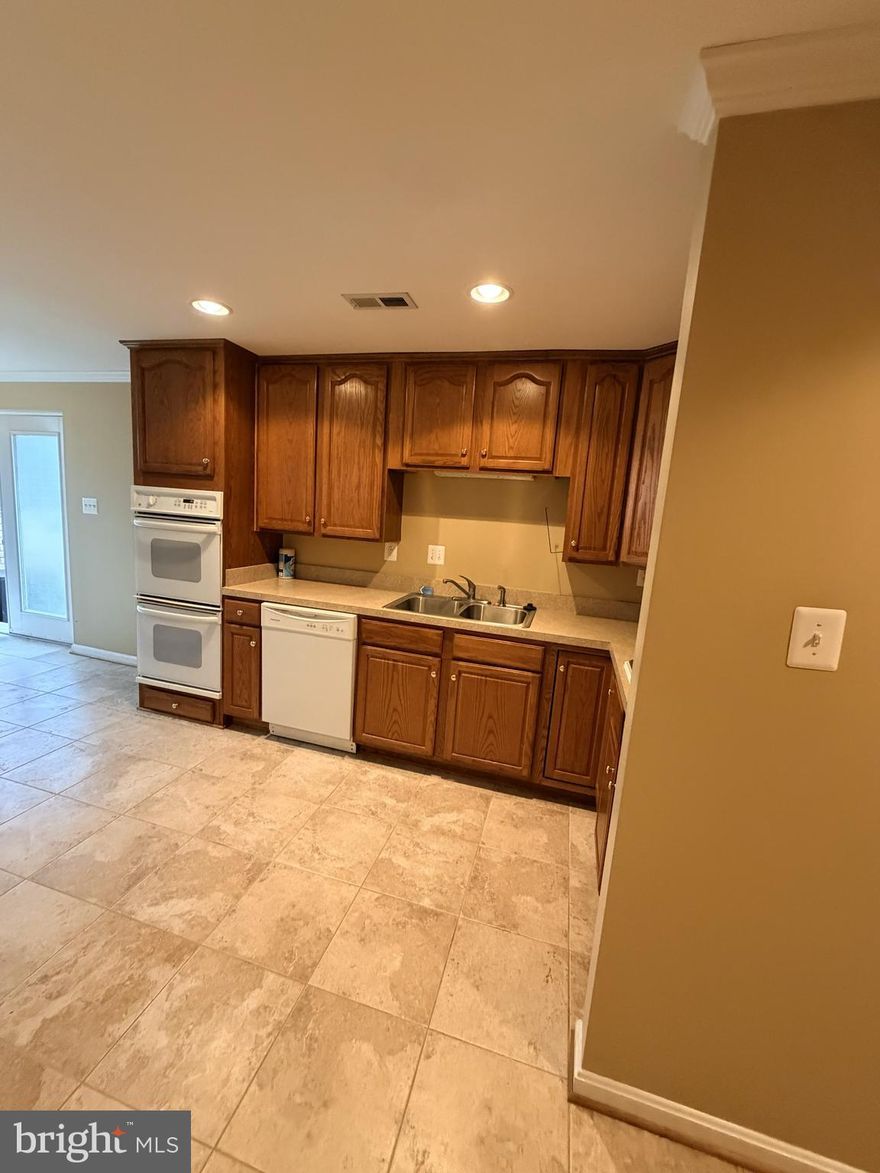 Super clean extra large basement apartment, including all utilities. Full updated kitchen, updated bathroom large bedroom , open living, kitchen, dining combo.  The entrance to this apartment is at the rear of a single family home.