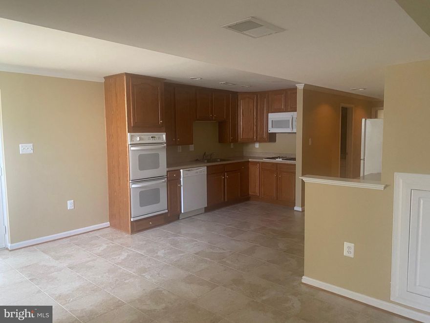 Super clean extra large basement apartment, including all utilities. Full updated kitchen, updated bathroom large bedroom , open living, kitchen, dining combo.  The entrance to this apartment is at the rear of a single family home.