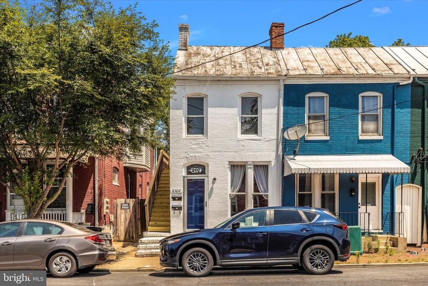 Darling two unit property in super convenient W. 5th Street location.  This little charmer features two apartments.  The lower level is a 1  BR/1 FBA with full kitchen, living room, laundry room, and a den/closet/flex space.  The front living room shows itself off with the original floor to ceiling window and decorative fireplace.  Down the hall is your full bath, and laundry room.  The eat-in kitchen is large enough for a four person table.  In the far back is the charming bedroom and bonus room/closet/flex space.  In the upper level unit, you have 2 BR/1 FBA with full kitchen, cute living room and full bath.  Enter the unit into the kitchen area.  This layout has two bedrooms, one on each side of the house (front and back), with a washer/dryer hook up in the front bedroom.  A super cozy living room can also house a table for casual dining.  The back yard is low maintenance and fully fenced.  You have parking in the back for two cars.
Live in one unit and rent the other.  Purchase as an investment and rent both units.  Or Air B&B them all!  This location is prime time walking distance to downtown, Hood College and Baker Park.  Super functional space with loads of character.  Very unique offering.