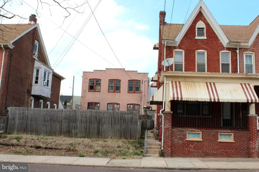 SPACIOUS 4 BEDROOM TWIN with super side yard, NEWER ROOF, low maintenance brick and stucco exterior,  All the charming amenities of early 1900s homes that are not seen today - hardwood floors, 10” baseboards, solid 4-panel wood doors, tall ceilings, pass-through bedrooms, brick fireplace, wrought iron railings, and beautiful colored glass transom windows.  Other improvements include 9”  luxury vinyl plank flooring, ceiling fans, Formica kitchen counters, stainless steel sink, GE electric range, INSIGNIA refrigerator, HOT POINT washer and WHIRLPOOL dryer, Full basement and storage spaces in the kitchen, large 2nd floor hall closet, and 3rd level attic knee wall eave, Warm quiet reliable hot water radiator heat, Potentially sub-dividable??? - check with the Borough, Plenty of street parking, Quiet and peaceful part of town
