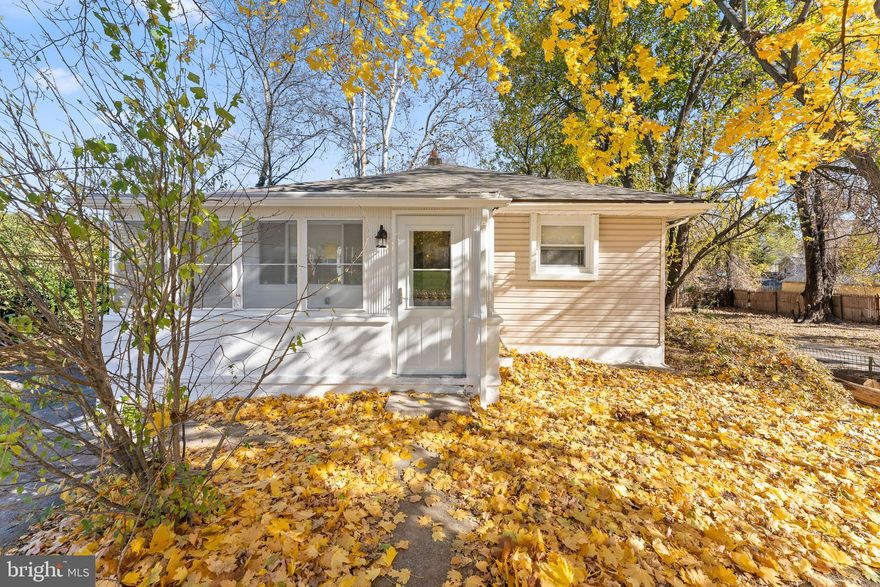 Welcome to 2125 Felton, where charm meets modern living in this beautifully remodeled ranch-style home. As you approach, the enclosed front porch beckons with its abundant windows, offering a perfect spot to soak in natural sunlight and enjoy the changing seasons. Step inside to discover a seamless blend of style and functionality. The open living room flows effortlessly into the dining room, creating a spacious and inviting atmosphere. Laminate flooring throughout adds a touch of contemporary elegance while maintaining a warm and welcoming ambiance.  The heart of the home lies in the kitchen, featuring white shaker cabinets, a center island with convenient seating, a stylish tile backsplash, and stainless steel appliances. Quartz countertops provide ample workspace for your culinary adventures, making this kitchen a dream for both cooking enthusiasts and entertainers alike. Down the hall, you'll find four bedrooms, each offering comfort and versatility. The hall bathroom boasts modern fixtures, while the centrally located full bathroom showcases a sleek tile shower, tile flooring, and modern black finishes, elevating your daily routine.  Closet space abounds, ensuring that storage is never a concern. The unfinished basement awaits your personal touch, offering the perfect space for storage or future plans to expand your home.  Step through the door off the kitchen and into the backyard oasis, where outdoor enjoyment awaits. Whether you're hosting gatherings, gardening, or simply unwinding after a long day, this backyard is a private retreat. Centrally located and completely remodeled, 2125 Felton is more than a home; it's a lifestyle. Don't miss the opportunity to make this charming residence your own—schedule a showing today!