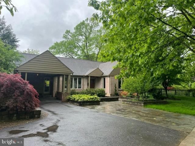 FOR COMP PURPOSES ONLY. Charming ranch in historic College Heights neighborhood just steps away from campus, PSU golf courses and downtown State College! This brick home features a spectacular outdoor space with extensive flagstone patio, wooden pergola and your very own brick pizza oven. Surrounded by a backyard fence and mature landscaping, this private oasis is ideal for entertaining or enjoying the outdoors. Inside, be greeted with a delightful open floor plan which features the kitchen, dining and living areas in one open space. This chef's kitchen is sure to appeal to any gourmand with custom walnut cabinets, gas cooking, stainless steel appliances and an extra prep sink. It's easy for friends and family to gather around the spacious island seating with quartz counters and a large farm sink. The living area showcases luxurious hardwood floors and a cozy wood burning fireplace. The main floor also boasts two full bathrooms and three bedrooms, one of which stuns with rich wood-paneled walls and a vaulted ceiling. Just when you think you've seen it all, descend to the lower level to find a great rec room with a granite bar, wine storage, drinks fridge and another full bathroom with beautiful tile shower. Truly a one of a kind home! An extensive furniture package was included as part of the sale.