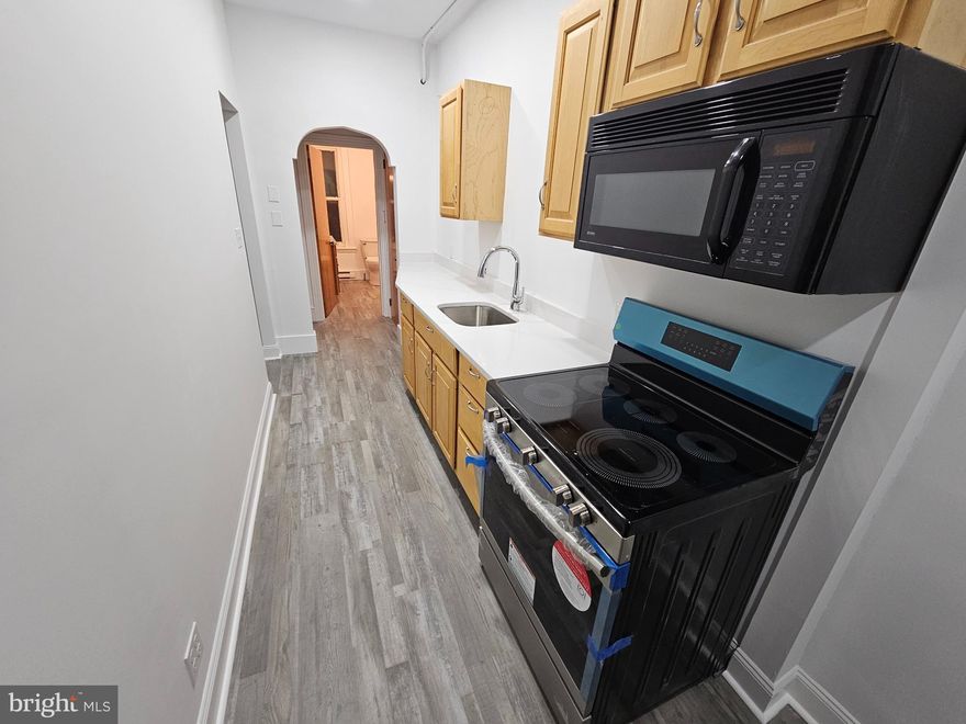 This is not a pet friendly property.  This 2nd floor totally remodeled apartment is ready for it's next tenants.  You will come into a brand new apartment with the Kitchen in the front of the apartment.  This is a narrow but very thoughtfully laid out kitchen with brand new stainless steel appliances.  There are lots of countertops and storage options and a great meal can be made in this kitchen.  Right off of the kitchen is the new bathroom with a tub/shower surround, new fixtures and vanity.  Come back through the arched opening to the Living Room/Dining Room combination room which is large enough for both.  High ceilings and there is a skylight that allows for natural day light to come in.  The Bedroom is off of the Living Room and has great natural light and is of good size.  The landlords are looking for tenants to have a credit score of 600 or more and have no criminal background.  No pets, please.  Non Smoking property.