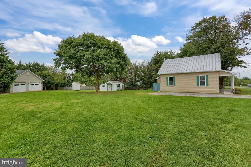 "TOTALLY RENOVATED" From top to bottom. Wait till you see the inside of this amazing home!!!!!  First floor Master Suite!! From the Gleaming Hardwood Floors to all new walls, ceilings, crown moldings, all new kitchen, and appliances, all new bathrooms with ceramic tiles and more. This is a house to bring your family to and make it a HOME!! Oversize garage with workshop. I just can go on and on about this home. You must come and see it and make it YOURS before it is gone!!!!