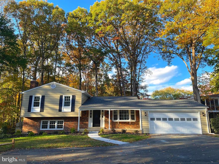 COMPLETELY RENOVATED.  FEELS LIKE NEW CONSTRUCTION WITH A RESALE PRICE.  DON'T MISS IT.   NEW ROOF, VINYL WINDOWS AND SLIDING PATIO DOOR, GUTTERS, FRESHLY PAINTED EXTERIOR, STAINED DECK AND SHED, FRONT SIDEWALK REPLACED, NEW LIGHTING, LANDSCAPING; NEW WOOD SHAKER 42" CABINETS, QUARTZ COUNTERTOPS, GE STAINLESS STEEL APPLIANCES WITH SLIDE IN STOVE AND REFRIGERATOR FREEZER WITH ICE MAKER AND WATER DISPENSER IN KITCHEN WITH ROOM FOR TABLE, LARGE PANTRY, LUXURY VINYL PLANKING THROUGHOUT THE HOME, NEW DOORS AND MODERN HARDWARE AND FAUCETS, ETC.,  INSTALLED ,  WARM AND BRIGHT WITH NEW RECEESSED LIGHTING THROUGHOUT.  ALL BATHROOMS COMPLETELY REMODELED WITH MODERN HARDWARE AND CERAMIC INSTALLED TO CEILING, TUBS, VANITIES, MIRRORS, ETC.  GLASS SHOWER DOORS TO BE INSTALLED IN MASTER BATH DECEMBER 5TH.  NEW WHIRLPOOL UPGRADE WASHER AND DRYER.  NEW DOORS THROUGHOUT.  VERY OPEN FLOOR PLAN.  FEELS LIKE NEW CONSTRUCTION BUT WITH A RESALE PRICE.  LOCATED OFF QUIET PIPE STEM WITH JUST ONE OTHER HOUSE.  PLENTY OF ADDITIONAL PARKING.  HOME SITS ALONGSIDE COMMON AREA WITH SMALL STREAM AND WOODED FOR PRIVACY.  REAR YARD IS LARGE AND FLAT AND FENCED WITH MATURE TALL TREES AND FEELS LIKE PARK LAND.  YOU'LL SEE DEAR AS IT SIDES TO COMMON AREA AND A QUAINT STREAM.  VERY PRIVATE WHEN FOILAGE IS IN BLOOM.  SPACIOUS TWO CAR GARAGE WITH OPENER.  NEW WHIRLPOOL WASHER AND DRYER.   HOME IS BRIGHT AND WELCOMING WITH ALL THE LAKE RIDGE AMMENITIES.