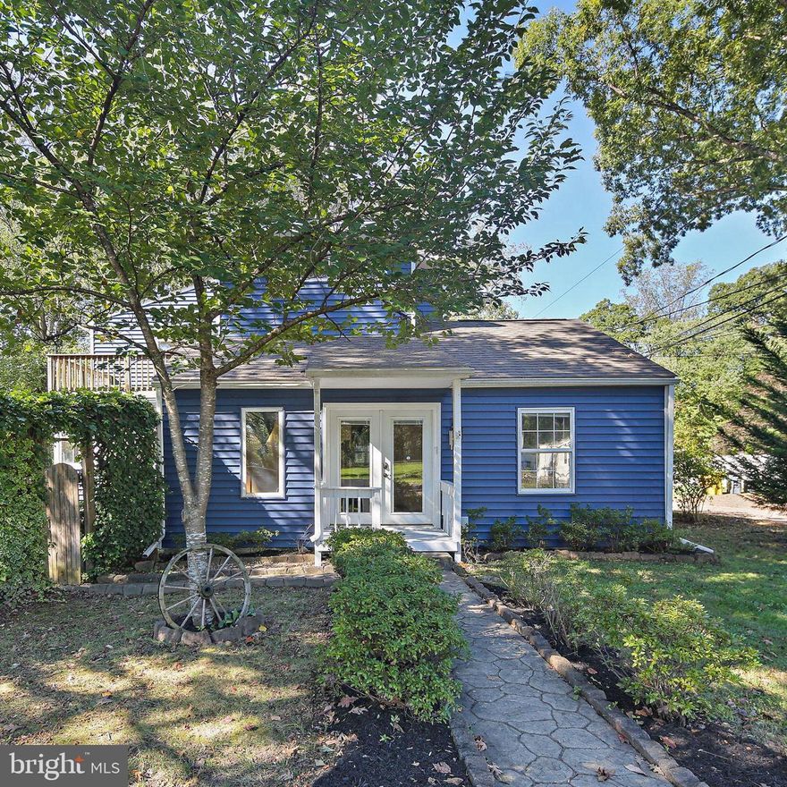 Welcome to 588 Saint Marys Avenue — a beautifully updated home where charm and comfort meet.
Tucked away on just over half an acre in the heart of Gambrills, this thoughtfully cared-for property offers 3 bedrooms, 2 full baths, and nearly 2,000 square feet of inviting living space. Step inside to a spacious entryway that opens to a cozy sitting area—perfect for greeting guests or curling up with a book. The main level also features a versatile bedroom, a formal dining room with built-in bookshelves, and a full bath with heated floors for that touch of everyday luxury. The bright, open kitchen will make any home cook happy, with hardwood floors, granite countertops, stainless steel appliances, cabinet lighting, and convenient counter seating. Just off the dining room, a sunny tiled sunroom creates the perfect spot to relax and look out over the backyard. A warm and welcoming family room seamlessly transitions into a recreation room with durable LVP flooring, with direct garage access to make day-to-day living effortless. Step outside to enjoy the spacious deck and above-ground pool, ideal for entertaining or simply unwinding at the end of the day.
Upstairs, the primary suite feels like a peaceful retreat, featuring LVP flooring and a private balcony—perfect for morning coffee while taking in the quiet country setting. The remodeled en-suite bath offers a spa-like feel, featuring a large walk-in shower, dual-sink vanity, and recessed lighting. A charming secondary bedroom with a barn door closet rounds out the upper level. This home has been lovingly updated for peace of mind, including a new roof (2021), siding (2024), HVAC (2024), remodeled primary bath, two newer hot water heaters (2021 & 2023), and updates to both the septic and well systems—all within the past two years.
Beautifully maintained, thoughtfully upgraded, and ready to welcome its next owners—588 Saint Marys Avenue is more than a house; it’s home.