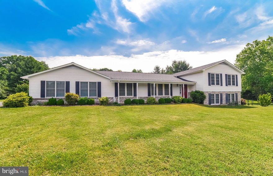 Magnificent opportunity to own this meticulously maintained home on 4 level Acres in the Luther T. Lee subdivision of LaPlata, MD. Three fully finished levels boasting separate Living Room, Dining Room,  Huge Kitchen with updated oak cabinets and granite; counter seating PLUS room for a dining table. Separate mud room perfectly situated off the garage with laundry on the main level.  Enormous 34' X 15' bonus room on lower level with walk-out basement access PLUS half-bath and ample storage. Spacious bedrooms, updated hall bath; Master Bedroom with updated on-suite bath & two large closets. Enjoy the serene pastoral views off the deck knowing your four legged friends will be safe inside the fully contained fenced yard. No HOA; minutes to shopping, dining and downtown. Don't let this one slip away. Come see this beautiful LaPlata home today.