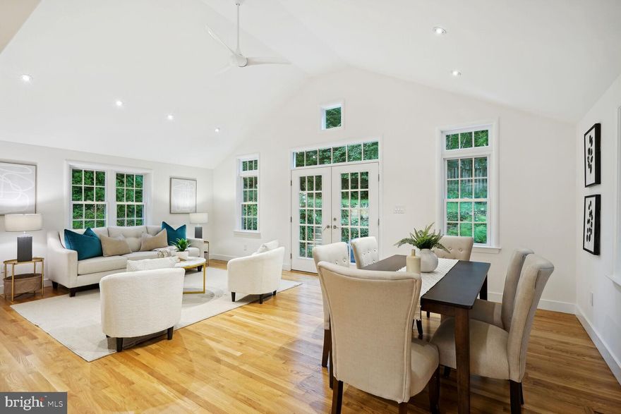 ***OFFER DEADLINE TUESDAY OCTOBER 1- AT 5PM***Mid century modern with spectacular addition in a gorgeous garden setting. 
Perched above the street, the home on its 11000 sf+ site, less than a mile to EFC Metro, 2 blocks to the Custis bike trail, four blocks to the wonderful Westover  shops, restaurants, farmers market, library,  and Cardinal School, offers an outstanding retreat.  
A gorgeous 2015 architect-designed addition opens  to the high-style kitchen with quartz stone counters, honey maple cabinetry and GE profile appliances. The  22’ x 14’  great room enjoys glorious light,  13 foot cathedral ceiling, recessed lighting and French doors to the private patio, beautiful plantings and a terrific large fenced backyard. The living room features a contemporary floor to ceiling brick hearth. The main level also includes three  bedrooms,  a full renovated bath and gleaming oak hardwood floors 

An open staircase leads to a spacious finished lower level  with ceramic tile floor, recessed lighting, two daylight egress windows, a  full bath and access to the attached garage with its  level 2 electric car charger. 

Fabulous stone hardscaping, stone walkways and paver driveway complete the outstanding  exterior.