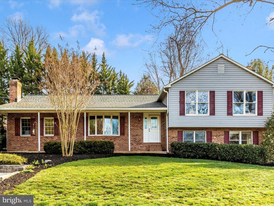 🏡 Welcome to this stunning 4-level split foyer nestled on this private lot.  Step inside to discover a freshly painted interior complemented by brand new hardwood floors. The spacious living room welcomes you with its built-in bookshelves  and beautiful stone fireplace, inviting you to unwind in front of a cozy fire. Entertain guests in the formal dining room, boasting ample space for hosting memorable gatherings. The heart of the home lies in the large eat-in kitchen, with abundant cabinetry for storage. Adjacent, a lower-level family room awaits, complete with another fireplace, ideal for relaxing evenings or movie nights with loved ones. Retreat to the tranquility of the private master suite, featuring its own bath, while three additional bedrooms offer comfort and versatility for family members or guests, with 3.5 baths in total. Its much larger than it looks at 3285 total square feet. Outside, a sprawling patio provides the perfect spot for al fresco dining or simply soaking up the sun in the expansive backyard. Revel in the privacy afforded by the generous lot, offering ample space for outdoor recreation with a basketball court and room for gardening enthusiasts. Convenience is key with a large parking area accommodating multiple vehicles. Don't miss the opportunity to make this fine property your own