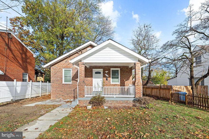 Run, don't walk, to see this beautiful new renovation! Everything has been replaced including the roof and electrical system. The kitchen has SS Frigidaire appliances, granite countertops with a breakfast bar, a 2-door refrigerator with an icemaker, a dishwasher, a garbage disposer, and a built-in microwave. There is laminate flooring and recessed lighting throughout both levels. Both bathrooms have luxury vinyl marble tile flooring with matching tile in the bath/shower combo.  Two bedrooms upstairs and another two in the fully finished basement. The separate laundry room has a ss utility sink, full-size washer and dryer, and a wall full of shelving. There is a covered back porch right off the kitchen. The backyard is fenced on 3 sides and is large and flat.  It even has a grape arbor! There is plenty of room for the fussiest gardener to grow plants or fruits and vegetables. Offers are due by Saturday at 6pm.