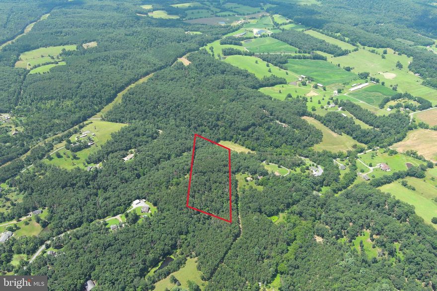A RARE FIND.....9 WOODED ACRES FRONTING ON QUIET PAVED COUNTRY ROAD, ONLY 1 MILE FROM THE VIRGINIA LINE AND 20 MINUTES WEST OF WINCHESTER, VA. IT'S SUPER HARD TO FIND ACREAGE IN THIS SOUGHT AFTER LOCATION. NO HOA AND NO RESTRICTIONS, EXCEPT THAT "NO ABANDONED VEHICLES ARE TO BE KEPT ON THE PROPERTY"......OTHER THAN THAT....YOU CAN DO WHATEVER YOU WANT! MULTIPLE BUILDING SITES, GOOD SPOT JUST OFF THE PAVED ROAD OR GO TO THE TOP OF THE RIDGE FOR MAXIMUM PRIVACY......ELECTRICITY ALONG THE EDGE AND THROUGH THE MIDDLE OF THE PROPERTY, THIS MEANS HUGE SAVINGS $$$$ ON INFRASTRUCTURE COSTS. ENOUGH LAND TO HUNT, SHOOT & RIDE ATV'S.....ALL WITHIN A SHORT COMMUTE TO WINCHESTER AND EXACTLY 100 MILES FROM DOWNTOWN DC! GETTING TIRED OF OPPRESSIVE STATE LAWS? HIGH TAXES? RIDICULOUSLY HIGH COST OF LIVING? MAKE THE MOVE TO ALMOST HEAVEN WV AND EXPERIENCE THE FREEDOMS YOU'VE LOST!