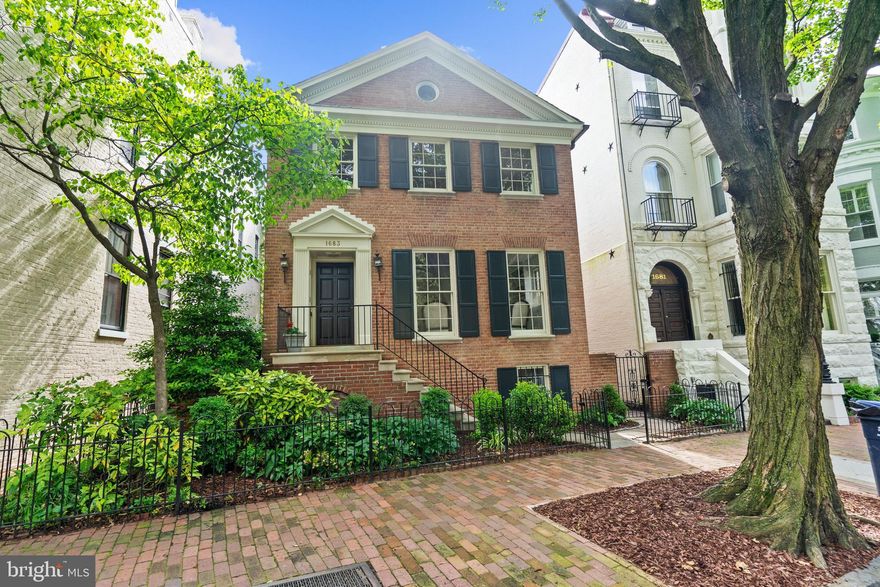 Situated in Georgetown's most desirable location nearby historic Dumbarton Oaks and Montrose Park and nestled among the finest houses in the neighborhood, this charming property boasts beautiful hardwood flooring, crown moldings, and exceptional natural light. The main level features a Formal Living overlooking the front yard, Kitchen with outside access, separate Dining Room, large Family Room with fireplace, Wet Bar, and Powder Room. Upstairs includes a spacious Master Suite, 3 additional bedrooms and Hall Bath. A spectacular walk-out Lower Level with a 2BR/1BA, Full 2nd Kitchen, cozy Den with fireplace, and separate laundry makes this home perfect for today's multi-generational living OR a spectacular Home Office. Complete with a large, private Patio off the Family Room perfect for entertaining, and easy curbside parking!