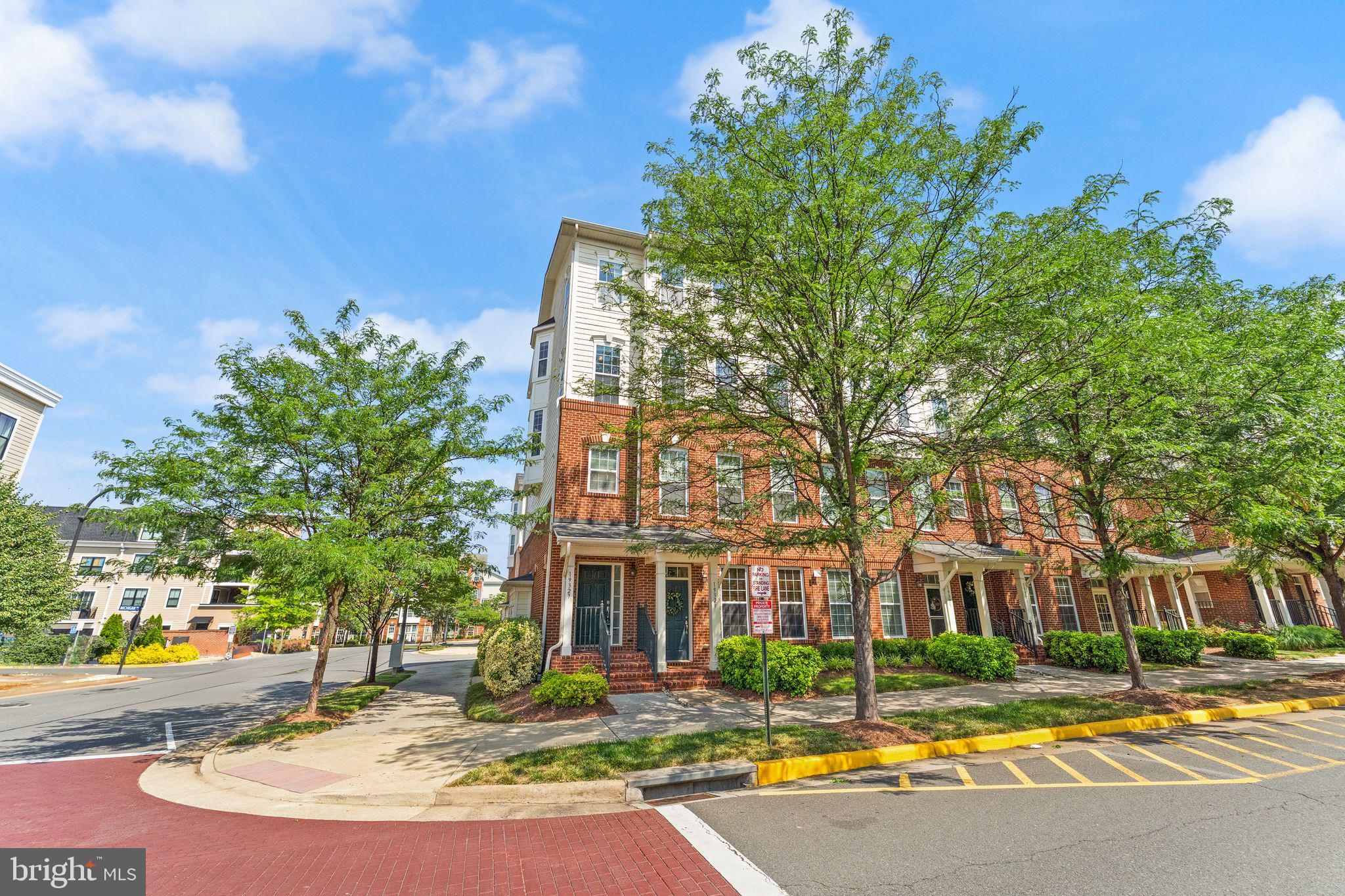 HUGE PRICE IMPROVEMENT! WHAT A GREAT PRICE to Live in the Heart of Lansdowne!
Who wouldn’t love living just a block from Lansdowne Town Center? With shopping, dining, and entertainment literally steps from your front door, this beautifully appointed END UNIT 3 bedroom, 2.5 bath home plus den offers both comfort and convenience in one of Loudoun County’s most desirable locations.
This spacious home lets in lots of natural light as an end unit and features an open concept main level with gleaming hardwood floors that seamlessly connect the living room, dining area, gourmet kitchen and eat-in area. A cozy double-sided fireplace adds warmth and charm, while the adjacent bonus room with beautiful bay window offers flexible space for a home office, playroom, or den. The kitchen is a chef’s delight with granite countertops, a center island, brand new stainless steel appliances (refrigerator, microwave, and ceramic oven top), and a sunny breakfast nook that opens to a private balcony — perfect for morning coffee or evening relaxation.
Upstairs, the expansive primary suite boasts a tray ceiling, dual closets including a large walk-in, and a luxurious en-suite bath complete with granite dual vanities, soaking tub, and separate shower. Two additional bedrooms, a full hall bath with granite counters, and a conveniently located laundry closet with upgraded washer complete the upper level.
Additional upgrades include brand new carpet, fresh paint throughout, new kitchen appliances (minus oven), and new faucets. A one-car garage with driveway adds practicality to the home’s long list of perks. Also, trash and snow removal, 1000 Mbps basic internet via Comcast. and water included in Association fee!
Great amenities like pool, fitness room, playgrounds, walking trails - and with Route 7, Route 28, Belmont Ridge Road, One Loudoun, and Dulles Airport just minutes away, this home offers an unbeatable location and access for commuters and frequent travelers alike. Don’t miss this rare opportunity to live just steps from everything Lansdowne has to offer!