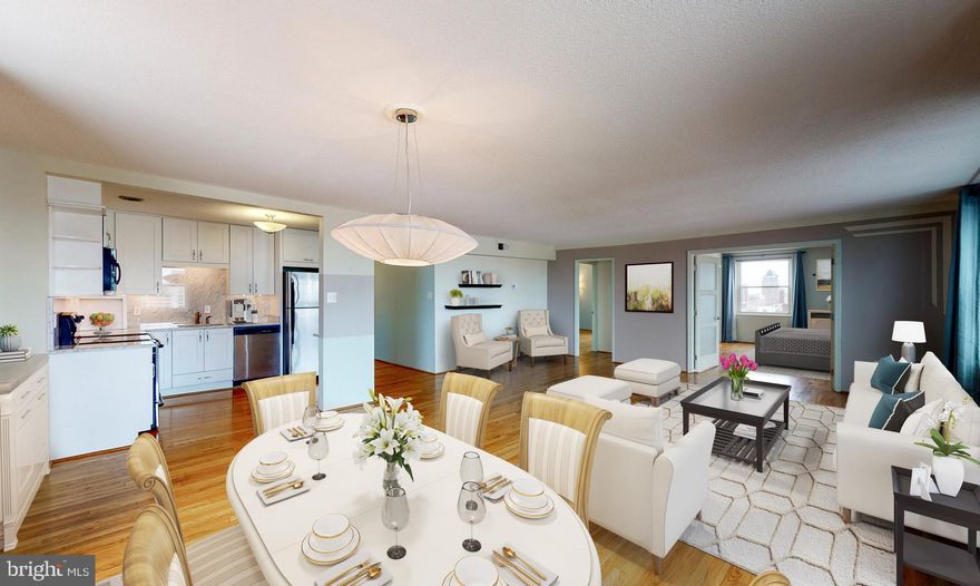 Completely remodeled, 2 bed / 2 bath condominium with breathtaking city views from the 16th floor. Contains stunning white marble countertops and stainless appliances in the kitchen, with stunning Brazilian hardwood flooring throughout. The two spacious ensuite bedrooms with updated bathrooms are located directly off of the main dining and living space. The kitchen flows effortlessly into the living area, allowing light to illuminate the combined space from almost every angle. Located near The Peabody Conservatory, The Walters Art Museum, Center Stage, The Meyerhoff Symphony Hall, and the Maryland Historical Society. The building's main lobby, mailrooms, conference room, and all upper-level hallways are scheduled for renovations and redecorating in the near future. One valet parking space conveys with the unit. Be sure to check out the 3D virtual tour!