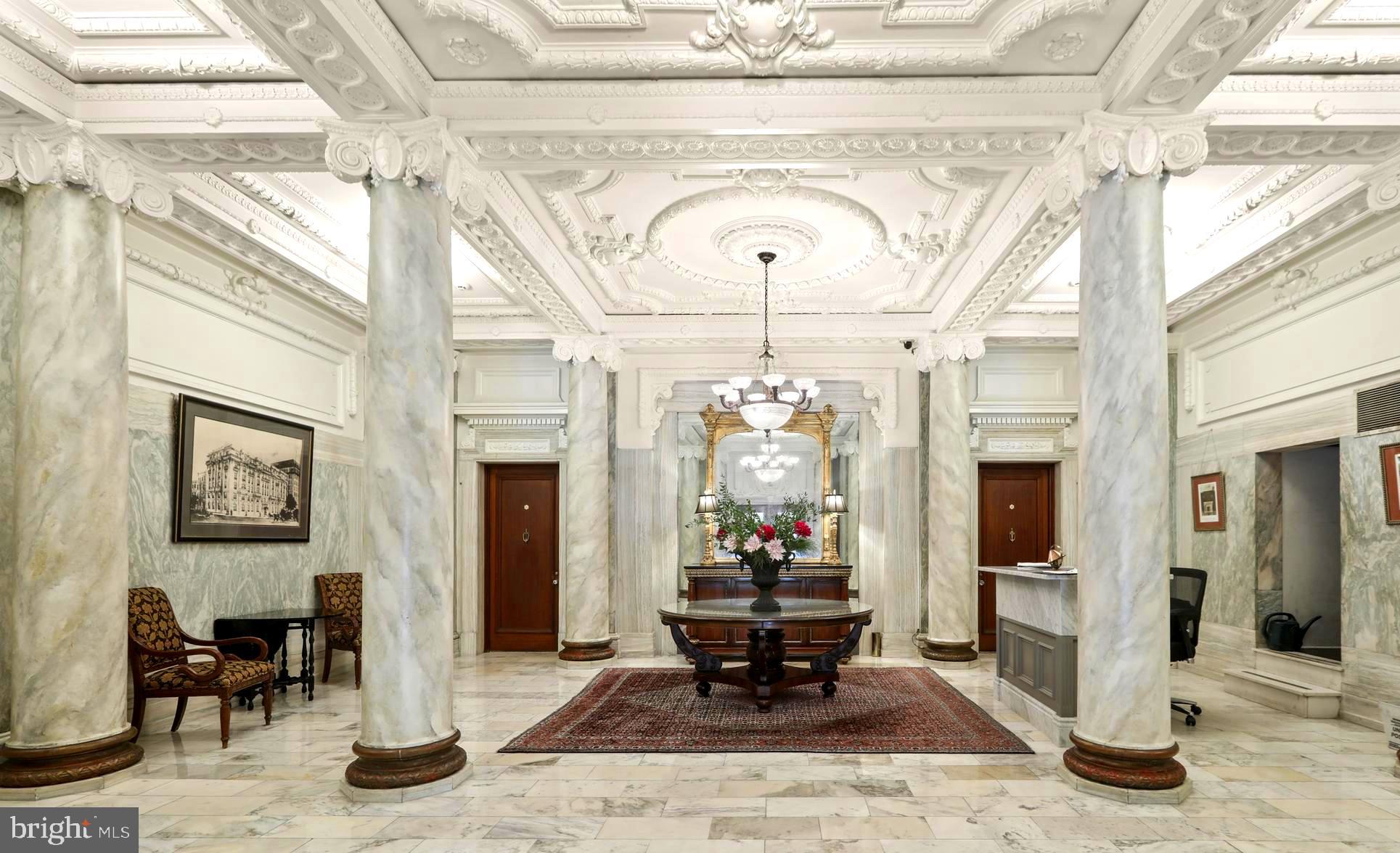 Paris in Mount Vernon! Unbelievable, Magnificent, Largest Floor Plan in Coveted Washington Apartments!!! Stately Beaux Arts Building on Historic Mount Vernon Place, Large Inviting Foyer with In-Laid Hardwood Flooring Throughout, Large Double Living Room and Dining Room with Original Marble Fireplaces, Custom Bookshelves, Designer Wallpaper and Draperies. High Ceilings with Breathtaking Original Gilded Moldings. Floor to Ceiling Windows, Updated Kitchen and Bathrooms, Three Spacious Bedrooms. Large Storage Room in Lower Level, All Within Close Distance to Penn Station, Fine Restaurants, Baltimore Symphony Orchestra, The Walters Art Gallery, Peabody Institute, Center Stage, Johns Hopkins, the Inner Harbor, and So Much More!! Taxes Included in Coop Fee! 24 Hour Door Person!
