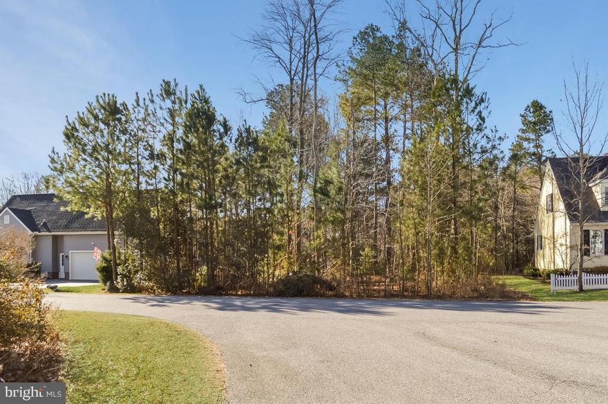 Build your dream home on this 0.27 Acre Lot in the Ocean Pines Community, Colonial Village. Nestled on a quiet cul-de-sac, live close to the Cove restaurant, outdoor pool, marina, & scenic coastal wildlife. OWNER IS ALSO SELLING DEEDED BOAT SLIP #D4 AT PINES POINT MARINA, OCEAN PINES: 46' deed boat slip in Pines Point Marina MLS# 1001557222, sold separately from this lot. Buy LOT 41 & live .5+/- miles away from your boat, marina, & entertainment.