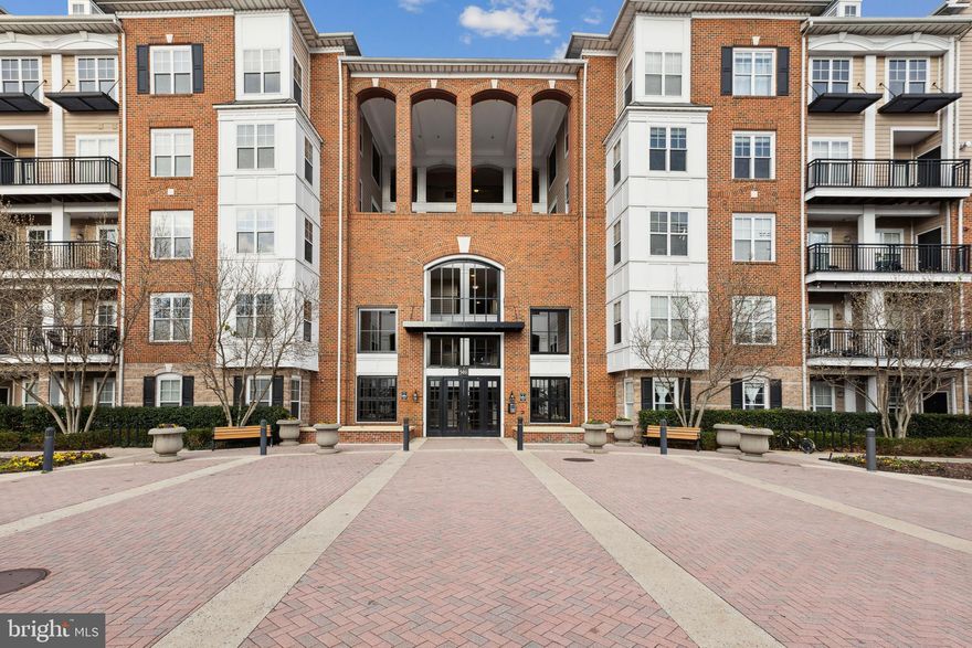 The Sellers have loved living here! They've enjoyed the patio opening to the beautiful courtyard. They've loved the proximity to the Rockville Metro Station and the Rockville Town Center. They appreciated the secure building, the garage parking and the building's amenities. Now it is time for a new owner who will be able to move right in! 2 bedrooms and 2 full baths. Laminate flooring in the living areas. New carpet in the bedrooms. Primary bedroom includes a soaking tub and walk-in closet. Newer HVAC (2017), HWH (2017),  Refrigerator (2022), Washer (2022).  2 deeded parking spaces convey (#s 119, 120). Internet and Cable is included in the condo fee. Secure building with on-site property management during business hours. Amenities include billiard room, club house,  fitness center, media room, dog play area, and outdoor pool. Packages delivered inside. This first floor condo is convenient to the adjacent shopping center, parking garage, trash area.