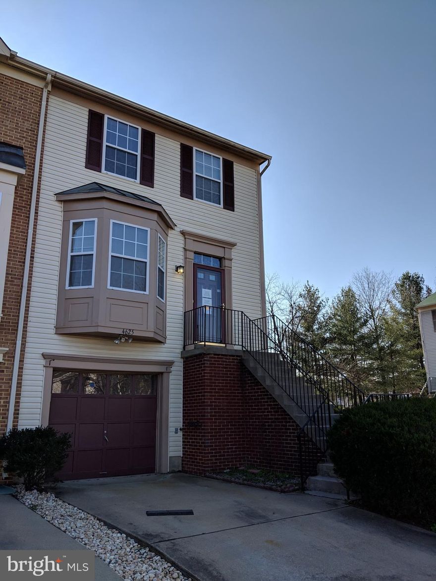 Spacious end of group home in great condition with wood floors on first level, new appliances, freshly painted, new carpet  on second and lower levels, deck off kitchen.  Super convenient location with easy access to Capitol Beltway.  Buyer pays all transfer and recordation taxes.