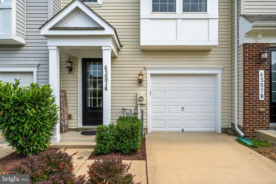 ***Seller is offering $2,500 for Carpet Allowance** Step into this inviting and well-designed townhome, ideally positioned in the heart of St. Mary's County in the very popular community of Wildewood in California, MD. Spread across three thoughtfully planned levels, this interior unit shines with an abundance of natural light, spanning over 2100 sqft of comfortable living space. It features three bedrooms—two expansive top-floor rooms with en suites and large walk-in closets, complemented by a generously sized third bedroom on the bottom floor, complete with its own bathroom. The Primary Bath includes a double vanity with upgraded faucets, upgraded tub/shower base with tile to the ceiling and accented with a listello. Shower includes a rain head in addition to the standard showerhead.  The home includes a total of 3.5 bathrooms.

This residence boasts hardwood floors in the first floor foyer and hallway, adding warmth and elegance as you enter. Convenience is a priority with laundry facilities strategically located on the top floor. The kitchen, a blend of functionality and style, is equipped with solid hardwood floors, sleek granite countertops, a practical pantry, and modern recessed lighting. Additional features include a garage and a substantial composite deck. The townhome backs up to trees, offering enhanced privacy and a serene view, perfect for indoor and outdoor living.

Residents enjoy community amenities such as a pristine swimming pool, scenic walking trails, and a welcoming park, catering to both relaxation and active lifestyles. The prime location ensures easy access to local shopping, entertainment, and swift commutes to NAS PAX RIVER, putting every convenience within easy reach. This home is not just a living space but a lifestyle choice, offering a perfect mix of privacy and community features. Take advantage of this opportunity in Southern Maryland. Take advantage of this opportunity in the very popular community of Wildewood, with the Seller offering $2500 towards a flooring allowance to make this home your own!
