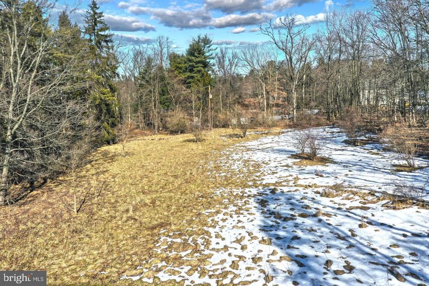 A rare opportunity to build your dream home.  Over 2 acres ready to go!  Perc and probe complete.  With generous acreage and rural private wooded setting, yet convenient to amenities.