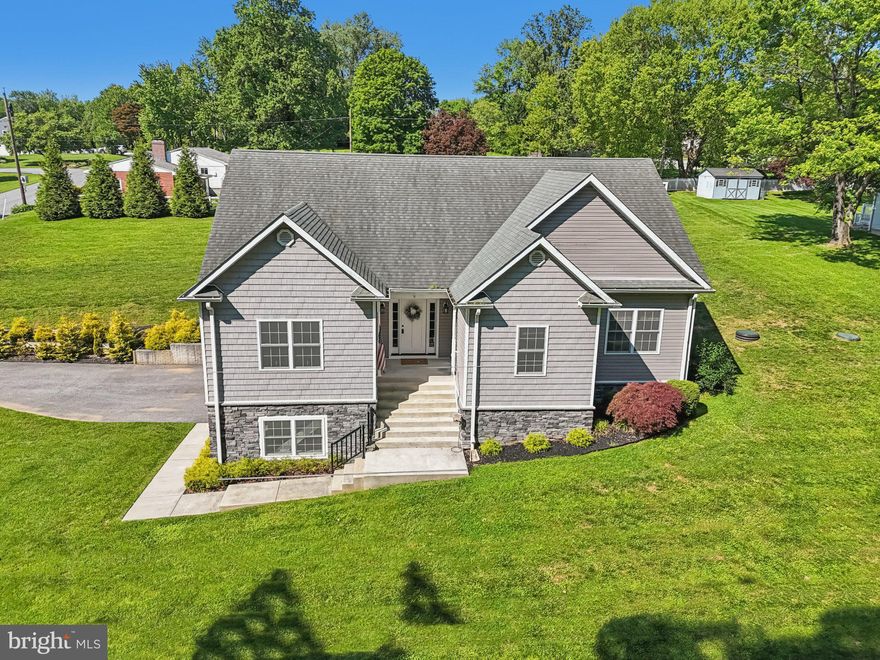 **OPEN HOUSE CANCELLED****REDUCED* Welcome to this Craftsman Style rancher. set on .92 of an acre. Built in 2016, this home offers the perfect blend of modern elegance and rural charm. Enjoy an open-concept layout with cathedral ceilings, hardwood floors, recessed lighting, and a striking electric fireplace with custom shiplap with walk-out access to a maintenance-free deck that steps down to an amazing stone patio with a pergola, stone walls, and a built-in fire pit to enjoy year-round. The main level has three spacious bedrooms and two full baths, a separate laundry room with a granite countertop, and plenty of storage throughout. The large master suite has a spacious walk-in master closet, ceiling fan, and an en-suite bathroom with a double vanity with quartz top, custom tiled shower and flooring. The guest bathroom also has a double vanity with a quartz top and custom-tiled walls and flooring. The lower level is finished with a massive open family room with recessed lights, a full bathroom, two utility rooms for HVAC (2016) and hot water heater (2021), storage, and a water treatment system (2024). Easily add a fourth bedroom with an egress window while maintaining plenty of space for a family room. Here you feel like you're living in the country with a quiet community, afternoon walks pass horse farms, minutes away from Red Barn Ranch and top-rated schools, while easily accessible to I70 or I795 from 140, 32, or 97. You're close to the active downtown Sykesville, minutes away from shopping and restaurants. A dream property! A rare find, don’t miss the virtual tour!