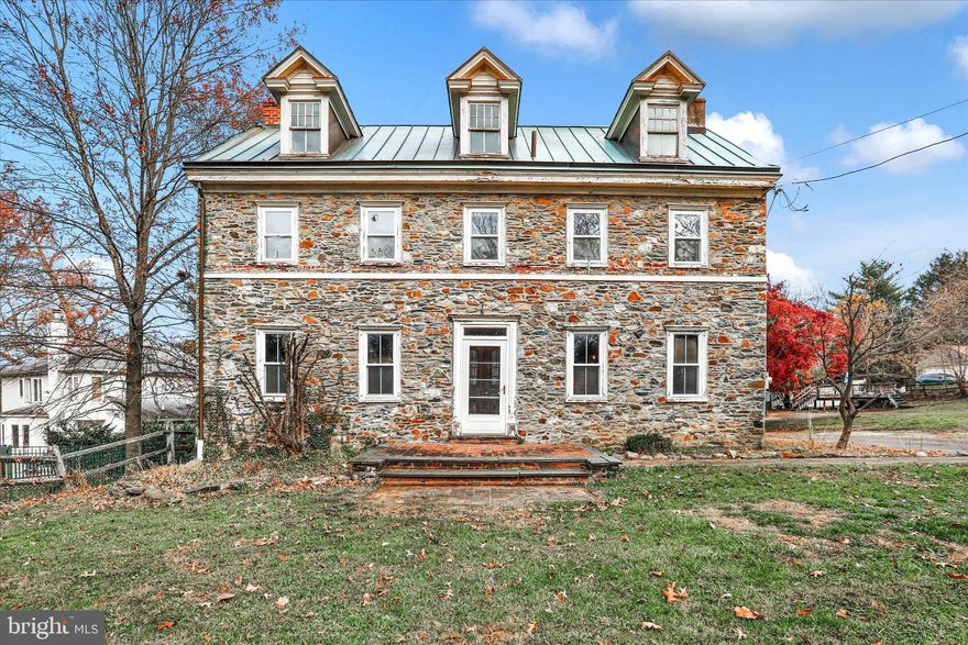 Captivating 19th-Century Farmhouse with Endless Potential (This home needs some work inside and out)
 Discover the allure of this charming circa 1800 farmhouse nestled on a generous .42-acre lot in the desired Huntingdon Valley, boasting three bedrooms with the possibility of expanding to five by including the top floor. Located within the Highly Rated Lower Moreland School district, this historic gem offers not only a residence but also the original two-story barn, presenting an ideal opportunity for a possible in-law suite conversion. The home welcomes you with spacious rooms adorned with original planked wood floors and features three fireplaces that add warmth and character. A curved rear staircase leads to the main bedroom, while the top floor offers potential for two additional bedrooms, an office, or a crafts room, bathed in natural light from two skylights. Plus plenty of space for an inground pool on the side yard. Preserving its historic charm, the property showcases built-in window seats, stained glass window and lampshades, original fireplace mantels, and a large basement fireplace where culinary delights were crafted during warmer months in years past. Other historical artifacts are displayed in several of the photos. The main bedroom also features it own private powder room. Conveniently located within walking distance to Bethayers Train Station and bus transportation, this residence is just a short drive from numerous malls, restaurants, and stores. Additionally, it provides easy access to Redeemer Health and various medical services, with the Pennypack Trail just a stone's throw away. Immerse yourself in the timeless elegance and potential of this remarkable farmhouse, blending history with modern living in a coveted locale. Home being sold As Is seller will make no repairs.