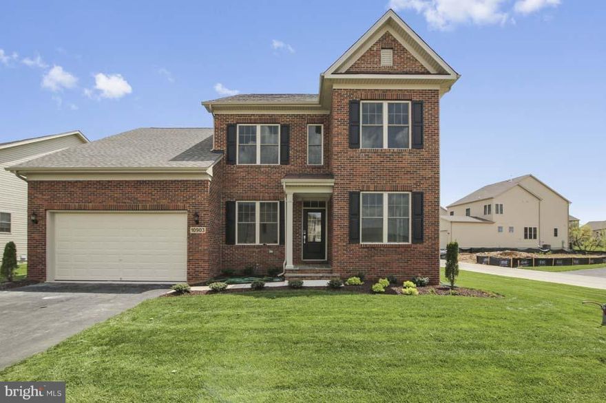 Open floor plan with all hardwood on first floor with a fireplace, beautiful owners bedroom with a trey ceiling
