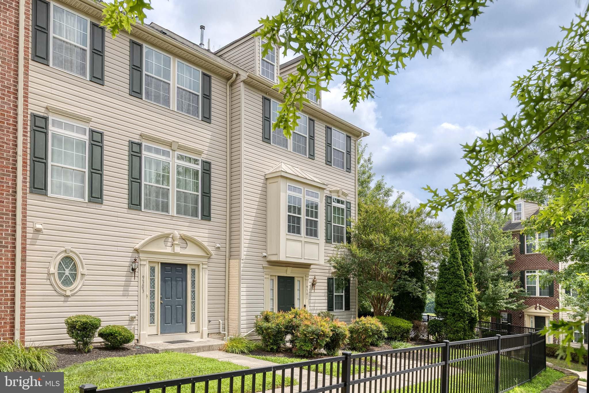 Once the model home for the community, this stunning residence is filled with high-end upgrades and designer finishes throughout. The main level boasts rich hardwood floors and a true open-concept layout, offering seamless sightlines from the kitchen all the way to the living room. The chef’s kitchen is a showstopper, featuring a custom tile backsplash, an expansive center island with breakfast bar, sleek stainless steel appliances, and a built-in wine bar—perfect for entertaining. Upstairs, the spacious primary suite includes a large walk-in closet and a luxurious en-suite bath complete with a soaking tub and separate glass-enclosed shower. The secondary bedrooms are generously sized with ample closet space, while the fourth-floor loft offers flexible living options—ideal as an additional bedroom, media room, or an exceptional home office.