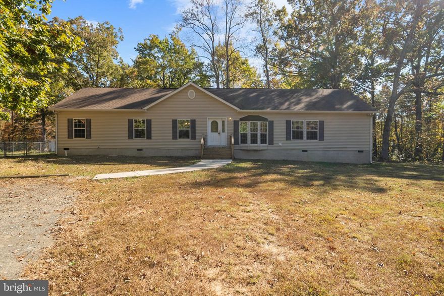 Just Listedi in Anna Pine Estates!! And Priced to Sell! Spacious rancher style home nestled in a serene wooded lot, just over 5 acres with 3 bedrooms and 3 full baths along with a 2 car detached garage. You are going to love the privacy and one level living. The living room has a centerpiece fireplace enhancing the beauty of the home. The open concept and large windows make the home feel bright and inviting. The home is great for entertaining, with a large kitchen with an island is a cook's delight along with an adjoining dining area with a large window giving scenic views of the backyard. You are going to love the rear decking and fenced in back yard. The three bedrooms are very spacious, with large closets and carpets. The master bedroom has a huge cedar closet and large bathroom with soaking garden tub. You will find an expansive walk up attic that is perfect for storage. The systems of the home are all in very good working condition and the home is easy to maintain with newer roof and vinyl siding. Don't miss you opportunity, this one is going to go quickly and is priced very well! Detailed floor plan is available.