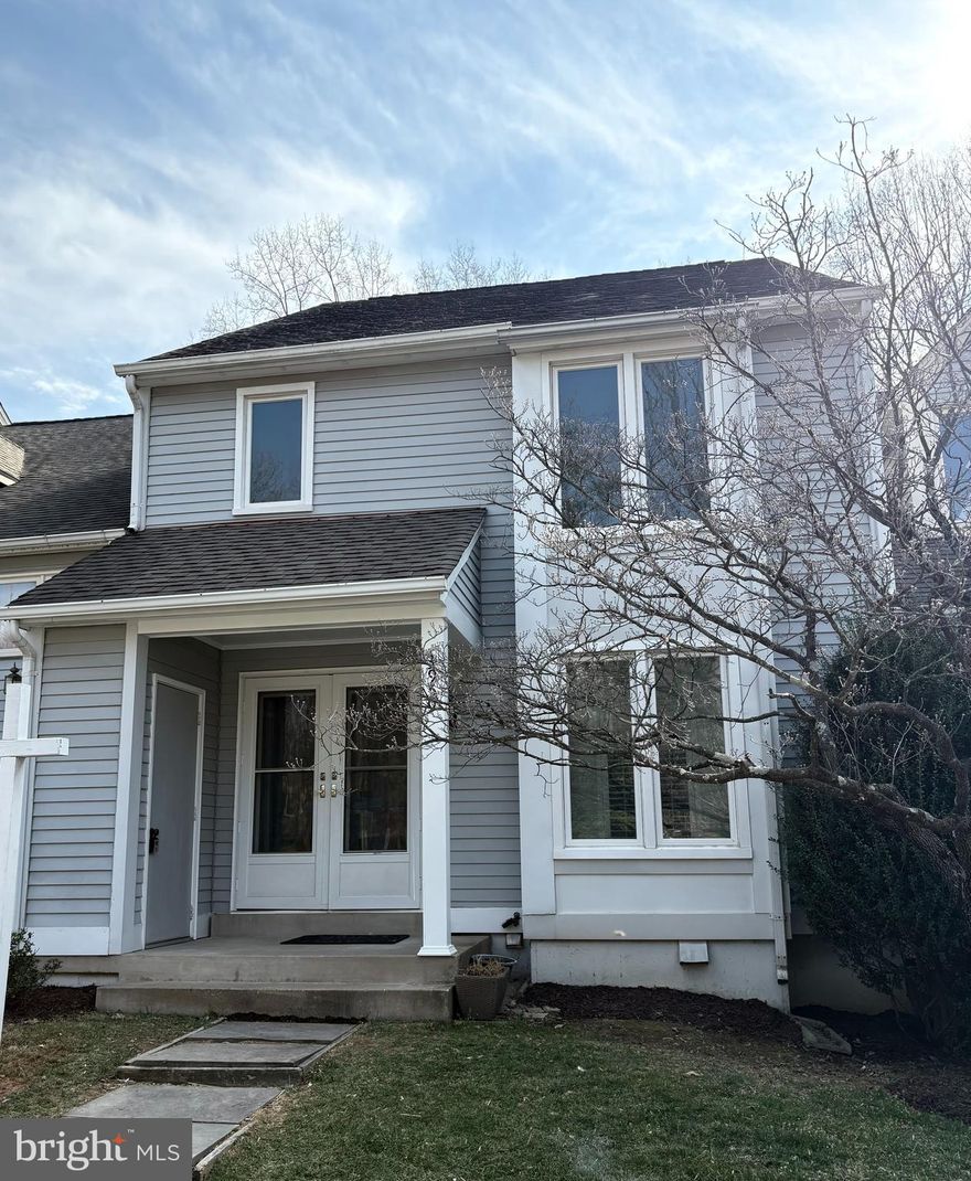 This updated home is in a highly sought-after location within the Navy Elementary, Franklin Middle, and Oakton High School district. It's conveniently close to major roads like Rt. 50, Rt. 66, and the Fairfax County Parkway, and is within walking distance to shops and restaurants like Harris Teeter, Starbucks, Corner Bakery Café, and Bruster’s Ice Cream and more.

Inside, the home is move-in ready with fresh paint, hardwood floors throughout the main level, and new lighting. The updated kitchen features granite countertops, stainless steel appliances, and light cabinetry, making it perfect for everyday meals or entertaining.

The spacious dining room overlooks the family room, which has newly installed hardwood floors, new recessed lighting, wood-burning fireplace, and opens up to a deck with a view of the wooded backyard, ideal for relaxing or hosting guests.

Upstairs, the large primary suite includes a walk-in closet and a beautifully updated bath with a new vanity, modern fixtures, tile floors, and a separate tub and shower. There’s also a second spacious bedroom with access to a newly updated full bath.

The walkout lower level features a bedroom or den, a third full bath, and a renovated wet bar with a quartz countertop, sink, and faucet. The cozy family room has a wood-burning fireplace, and new recessed lighting adds to the space. Doors lead to a lower-level patio, and there’s plenty of storage, including a laundry room.

The home also has an oversized garage and assigned parking right in front. Schedule a private tour today to see everything this wonderful home has to offer!