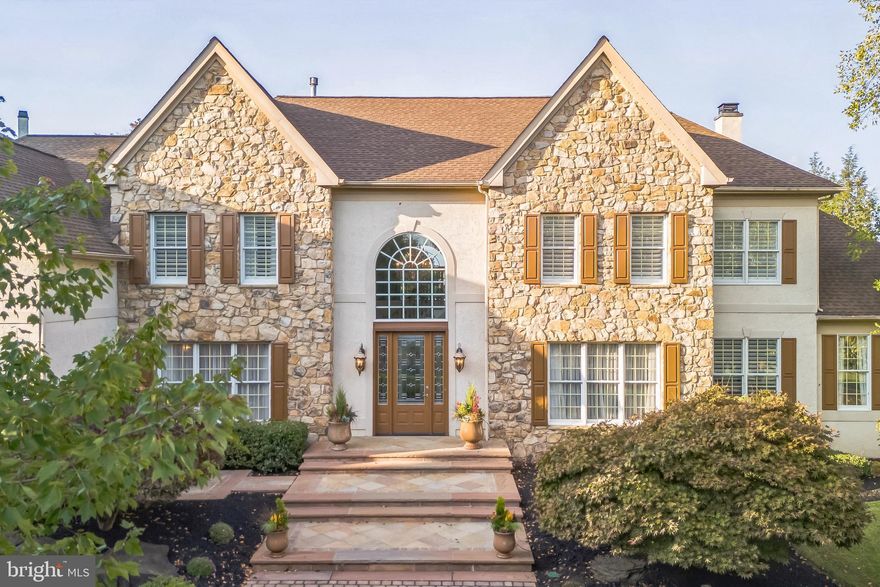 Welcome to the prestigious community of River Crossing, nestled in the heart of New Hope, Pennsylvania. River Crossing is known for its timeless charm and architectural beauty, home to some of the most iconic residences in Bucks County. Legacy Properties is honored to present what is truly the crown jewel of this idyllic neighborhood: 55 Woodside Lane. This executive home offers unmatched elegance and one-of-a-kind custom features not found in any other home within the community. As you arrive, you're greeted by a meticulously manicured lawn and breathtaking landscaping that spans nearly two acres, an outdoor masterpiece that would impress even the most discerning landscape designers. A tree-lined, double-wide governor’s driveway leads you to the entrance of this grand home. Step out onto an expansive custom stone entrance and take in the beauty of the eight-foot-tall, three-point locking custom front door, a unique architectural feature exclusive to this home in River Crossing. Inside, custom hardwood flooring flows throughout both levels. The grand foyer welcomes you with a stunning new crystal chandelier, setting the tone for the sophistication that lies within. A custom artisan-crafted staircase adds to the striking beauty of the entrance. From the center hall, you’ll enter a gourmet chef’s kitchen, ideal for hosting large gatherings. An impressive two-story breakfast area creates an airy, light-filled space perfect for casual dining. Adjacent to the kitchen is a formal dining room that comfortably seats up to twelve guests, located just beyond the butler's pantry ideal for elegant entertaining. The large family room, expanded to approximately 900 square feet, boasts large windows and skylights that fill the space with natural light. Enjoy cozy evenings by the stone gas fireplace or entertain at the custom bar with built-in ice maker and refrigerator as the centerpiece of this stunning room. Step into the tiled sun-filled conservatory, a perfect space for relaxing with a drink or enjoying a game of billiards. From there, enter the fully furnished private office, included in the sale of the home. The elegant living room completes the main floor. Before heading upstairs, don't miss the fully finished basement, which elevates the concept of a recreation space. This expansive level includes a full kitchen with custom cabinetry, wine and beverage refrigerators, an ice maker, and a dishwasher ideal for hosting large events. This floor continues with room for various activities including adult games, a gym, a TV viewing area, an entertainment area and more. A full bathroom featuring  a ribbon onyx  tiled shower, completes this incredible lower level. Outdoors, enjoy a resort-style oasis. The Arcadia multi-zone louver roof system with lighting and ceiling fans provides all-weather comfort, while the custom Anthony & Sylvan pool, complete with rock waterfall and spa, is surrounded by lush gardens and multiple lounging areas. The three-car garage completes the first level. On the second floor, discover the expansive and private master suite, featuring a cozy sitting area ideal for reading or watching your favorite show. The spa-like master bathroom includes dual vanities,with Quartzite a jetted tub, a private toilet room and a custom tiled shower. with Quartizte surround and showered seat.  This level also includes four additional bedrooms, each with adjacent full bathrooms, one of which features another jetted tub.55 Woodside Lane is an extraordinary home that truly has it all. To schedule a private tour, please contact me directly.