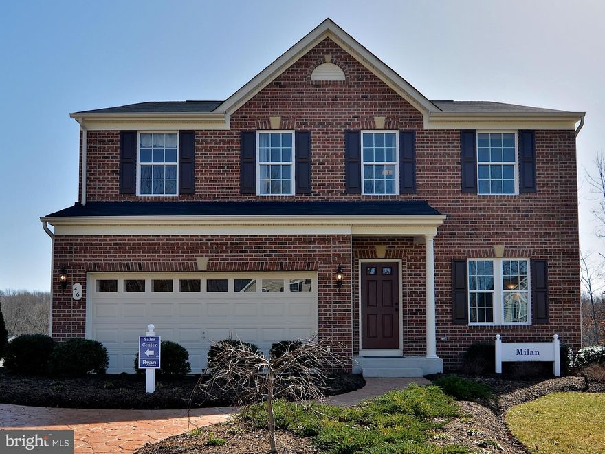 New Home on Corner Homesite w/ Wooded Views! The Milan offers an open floorplan w/ 2,700 sq. ft. of living space. Brick front, 2 car garage, morning rm, granite, stainless steel, hdwd floors, 4 BR, 2.5 BA, & more. Homesite premium add l. Located in Bentley Park less than 1 mile from I-95 & ICC. Pool & Clubhouse. Images shown are representative only.