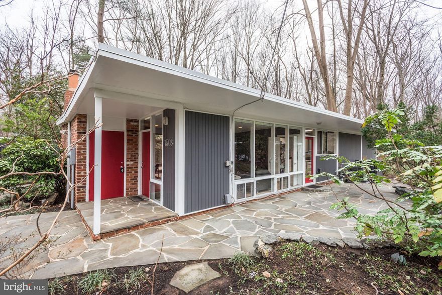 OPEN SUNDAY 3/10, 2-4pm. Chic and contemporary in Hollin Hills.   This beauty is a show-stopper. Updated from top to bottom. Sleek renovated kitchen sparkles and updated baths make this move-in ready. Skylights, as well as the floor to ceiling windows, absorb outdoor beauty and provide a serene and peaceful view from each room.    This home is a masterful example of high design nestled in nature. Whether you re grilling on the slate patio, relaxing on the deck, or playing in the yard you'll enjoy privacy and wooded backdrops. This home is truly a restful, bright sanctuary. A stand-out among Hollin Hills real estate.The master bedroom features a knockout bath which is sure to please. Natural stone elements compliment the other sleek finishes and highlight the smart contemporary design found throughout the home.Fine finishes and thoughtful design are displayed in every room. The kitchen is sleek and downright sexy. White glossy lacquer cabinets shine and black quartz countertops sparkle. It's a striking design combination that's illuminated by a skylight. A door from the kitchen to the patio make dining al fresco a fun and frequent request.Open concept living space leaves options for design. Owners could accommodate formal dining, casual living and Sunday afternoon naps in any of the large living spaces. Great flow throughout the home makes entertaining a crowd easy. Whether you're rejuvenating or hosting an event, the home suits either occasion flawlessly. Plenty of private parking and a free-standing shed make this home as practical as it is pretty. So many reasons you ll want to call this home your own. Visit today and fall in love.