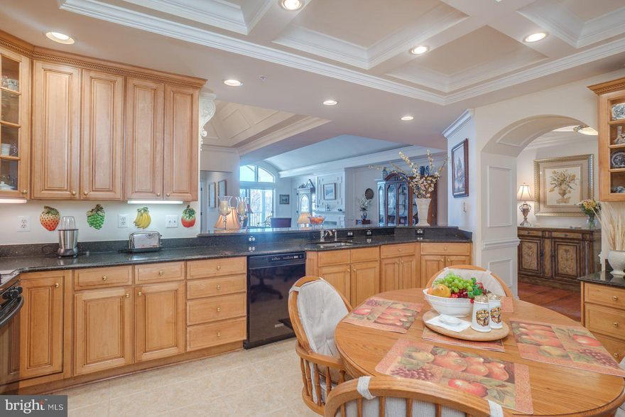 Warm weather awaits with this exquisite 2BR/2BA  penthouse gated waterfront community unit overlooking the Bush River w/ serene views from every room!  Owner pride exudes as pictures say it all...This radiantly lit, open floorplan home offers custom detailed moldings w/ upgraded coffered & barrel ceilings & neutral paint colors for any furnishing style.  Gleaming wood floors, 42" wood cabinets w/ under lights + bonus built in cabinet desk space, custom plantation shutters & window treatments, granite counters, breakfast bar, eat in area  & updated appliances that will entice all your entertaining desires.   Master en suite has unobstructed water views to start each day + balcony,  2 walk in closets & spacious bathroom w/ soaking tub to relax & unwind.   Dining area that opens to comfortable living room  w/ 8ft sliders to balcony access as well as an inviting gas FP for those chilly days while enjoying the pristine surroundings.  Newly installed HVAC (2019) w/ maint contract  & in unit laundry.  This lovely community offers  secured/intercom entry w/ elevator access, garage parking w/ 2 car parking spots that convey, add'l storage for all your needs, clubhouse/pool/fitness center/meeting rooms, meticulously landscaped gardens, walking trails, kayaking & boat access/storage just minutes away. Perfect locale to access I-95, APG, AMTRAK & more.  Life promises to become more enjoyable while living in Waters Edge!