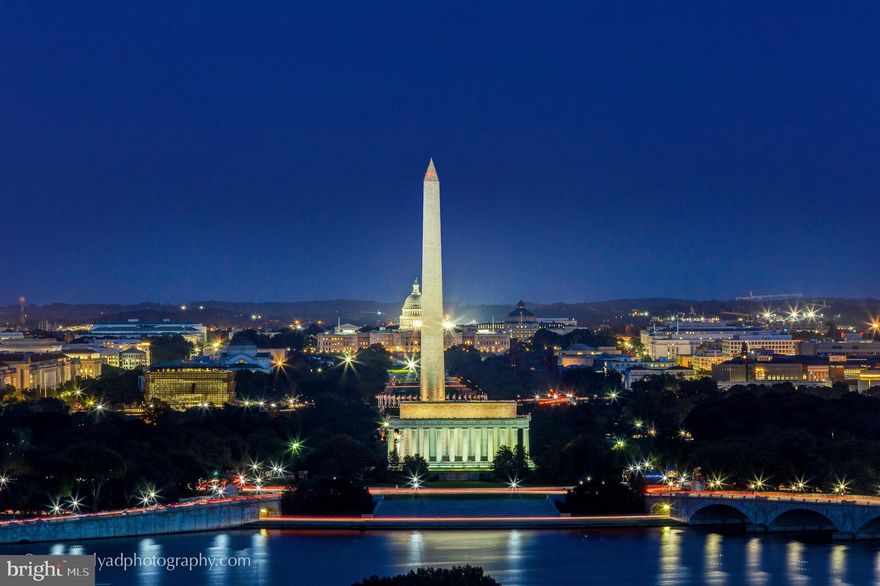 Two BR, two BA unit on the 11th floor of Prospect House. The view from this unit is spectacular - it overlooks the Washington, DC skyline, the iconic monuments and the river.  The living room has a 13 foot ceiling and looks out to the view and the spacious 21 ft. balcony with the eastern exposure.  You enter the unit on the 11th floor - the foyer has a large walk in closet. There is a flight of stairs down to the main living area with the wall of glass in the living room opening to the balcony.  There is an updated kitchen with granite counters and stainless steel appliances. The dining room is perfect for entertaining . The main bedroom has an en suite bathroom that is updated. The rent includes all utilities - tenant only pays for internet or cable.  Prospect House has an beautiful outdoor heated pool, state of the art exercise room, 24 hour desk service, security and community/meeting room.  There is also a convenience store on the B-level with dry cleaners.  You are minutes from downtown DC, Georgetown and Reagan Airport.  The Rosslyn Metro is 5 blocks away and Iwo Jima Park is 2 blocks from the condo.  Prospect House is a no smoking, no pets building.