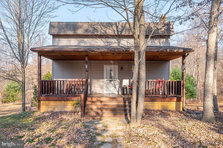 JUST REDUCED $15K!  Welcome to your secluded haven amidst nature's embrace! Nestled on 5.98 acres of tranquil land, this custom-built one-bedroom, one-bath cabin/colonial offers a unique blend of country charm and modern comfort.
Mature fruit trees adorn the landscape, hinting at the bountiful possibilities within this property's boundaries. Embrace the freedom of no HOA restrictions as you explore and shape this picturesque oasis to suit your desires.

Step inside to discover a cozy retreat thoughtfully adorned with barn board walls, exuding rustic allure and warmth. The inviting front covered porch beckons you to unwind in peaceful solitude while taking in the serene surroundings.

A standout feature of this abode is the full unfinished basement, currently utilized as a living room and equipped with a convenient pellet stove. This versatile space offers comfort and potential for further customization, catering to your individual needs and desires.

The property boasts a spacious 30x30 detached , providing shelter for two cars alongside ample workspace. Additionally, three sheds, including the practical Shedlogic, cater to various storage needs, ensuring convenience and organization.
Nature enthusiasts will revel in the blend of wooded areas and open clearings, inviting exploration or moments of quiet contemplation. With vast possibilities for outdoor activities or leisurely strolls, this property embodies the allure of natural beauty.

Offered AS IS, this property welcomes those with a vision to embrace a lifestyle of tranquility and seclusion in a serene sanctuary. Make this haven your own and relish the serene comfort it offers.

All this and located within 15 minutes to town and I-81 for traveling convenience.  Call for your private tour!