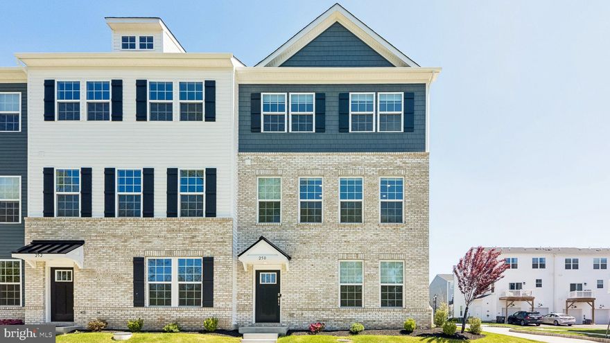 Now is the time to explore SteelPointe, one of Phoenixville‘s most newest and exclusive communities! A hop, skip, & stone throw away, this community is within walking distance to the Phoenixville Boro, which thrives every day with local businesses, restaurants, bars, and boutiques for your everyday living and nightlife ventures. 250 Smithworks Boulevard is a whole retreat in itself: tucked away privately towards the end of the community and with direct access to the biking and walking trail, this end unit townhome offers something for everyone! Just constructed and built in 2025, this townhome is less than one year young and has all the finishes and luxury amenities you would expect it should have. You will have peace of mind knowing the new build warranties are transferable to the next owner. This property is surrounded by a manicured green space and welcomes you as you approach the property. Enter into the first floor walk out finished area, ready for your every day office use, gym space, or additional living space however you please. This area walks out into the oversized two-car garage, which boast a generous amount of space for your belongings, as well as additional storage off to the side, which houses all of your mechanical systems. As you begin to explore the property, you will take in the gorgeous flooring, new paint, recessed lighting, overflow of natural light, and a sense of everything being brand new from every angle. The main floor has a huge straight through, open space offering you a combination of your main living room, dining room area, and a luxury kitchen you’ve been waiting to entertain in. The kitchen is a must see for its high-end design and finishes, including a stunning stainless steel appliance package, shiny, modern countertops, a prominent island with additional storage, and a modern tone splashed on the cabinets. Additional amenities include a generously sized walk-in pantry, high ceilings, motorized window blinds, and a deck right off the eat-in kitchen area. Completing the main floor is a half bathroom powder room. Continue to explore upstairs and you will immediately find the first two of three bedrooms. The first two bedrooms are generously sized, offering a ton of natural light with the property being an end unit, and they share a full bathroom in the hallway. The bathroom offers the same modern finishes as seen throughout. Continue through to see the walk-in laundry room, situated right in between the primary suite and the hall bathroom. The primary suite is a sight to see, offering an expansive bedroom, a huge walk-in closet, and an owner’s bathroom with dual vanities, a walk-in shower stall, and a private, enclosed toilet. Amenities throughout this community include walking trails and a dog park, but most importantly, a sense of community with easy access to everything that Phoenixville & the surrounding cities and counties have to offer you. Consider adding seeing 250 Smithworks Boulevard to your list of properties today!