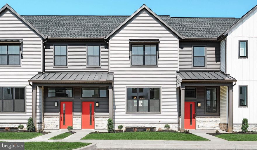 This 2-story townhome includes a 1-car, rear load garage, mudroom entry with built-in bench, and a patio for outdoor living. The first floor boasts 9’ ceilings and vinyl plank flooring. The kitchen is well equipped with stainless steel appliances, attractive cabinetry, and granite countertops. The kitchen opens to a spacious dining area and adjacent to a sunny living room. The 2nd floor owner’s suite features an expansive closet, and a private bathroom with a double bowl vanity and 5’ shower. Across from the suite are 2 additional bedrooms, a full bathroom, and a convenient laundry room.