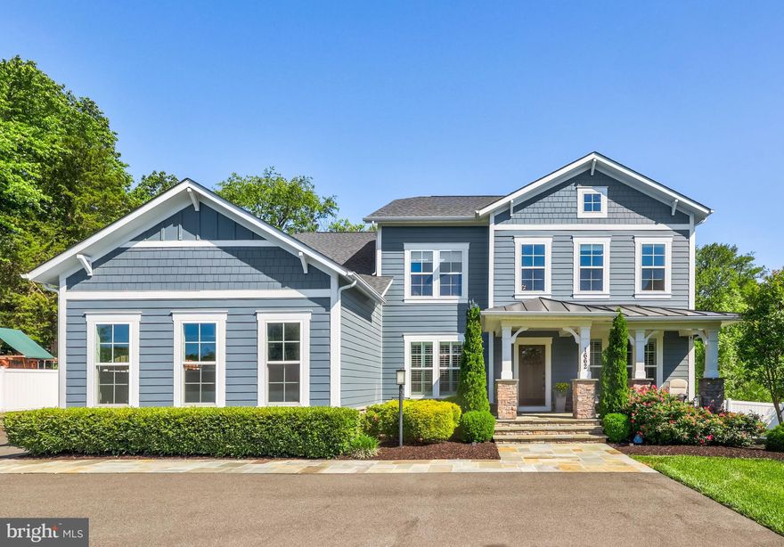 Prime Location Meets Luxury Living at 1662 Trap Rd! This exceptional 5-bedroom, 4.5-bathroom Craftsman-style home by Evergreene Homes is located in a top-tier school district and offers unparalleled access to local amenities. Enjoy concerts at Wolf Trap, shopping and dining at Tysons Corner, easy access to major roadways, scenic parks, and the W&OD Trail—perfect for biking, walking, and running. This home provides a lifestyle that truly offers the best of everything!

Set on over an acre, the fenced-in yard backs to serene, tree-lined privacy. With no HOA and connections to public water and sewer, this property offers flexibility and convenience. There’s plenty of space to add a pool or design your own private garden retreat—privacy and space like this are unmatched!

Follow the flagstone walkway to the welcoming covered stone front porch that overlooks the front yard. Step inside to over 5,300 square feet of thoughtfully designed living space, featuring crown molding and detailed trim throughout. The two-story foyer opens to a light-filled, open-concept floor plan with abundant windows and recessed lighting. Wide-plank hardwood floors grace the main and upper levels, adding an elegant touch.

The gourmet kitchen is a chef’s dream, featuring white soft-close cabinetry, quartz countertops, a stylish backsplash, a large island, high-end stainless steel appliances, and a spacious walk-in pantry. Perfect for entertaining or everyday living, the kitchen flows seamlessly into the living space and dining room, with easy access to the deck for outdoor gatherings.

The family room is a true centerpiece, showcasing a coffered ceiling and a cozy gas stone fireplace. A private main-level office offers quiet workspace, while the convenient mudroom off the three-car garage includes built-in shelving for smart storage.

Retreat to the luxurious primary suite with a tray ceiling, two walk-in closets, and a spa-like en-suite bathroom featuring a soaking tub, double vanity, oversized frameless shower with floor-to-ceiling tile, and a rain showerhead. Three additional generously sized bedrooms are located upstairs—one with an en-suite bath, and two that share a hall bathroom with dual vanities and a private tub/shower combo. A convenient upstairs laundry room with a utility sink and additional storage completes the level.

The finished walk-out basement offers endless possibilities with an open recreation area, a fifth bedroom, full bathroom, media room, exercise room, and ample storage space.

Additional highlights include energy-efficient construction, smart home features, elegant plantation shutters throughout, and an EV charger in the garage.

Don’t miss this rare opportunity to own a piece of luxury in an extraordinary location!