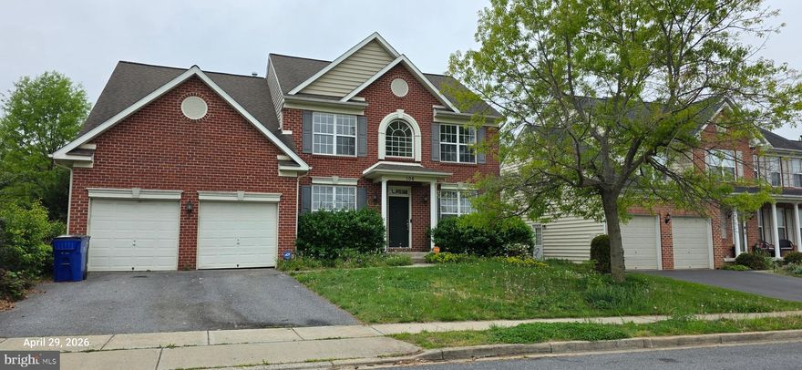 Brick front colonial, first floor office, very open and large layout, finished basement, with walk up. Sold as is