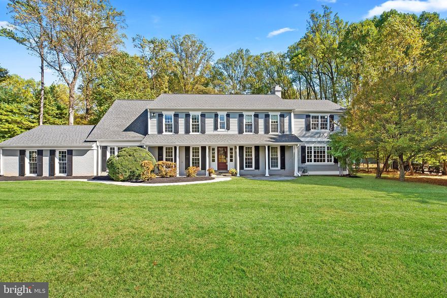 Welcome to this exquisite home nestled on a private, tree-lined street in the heart of Potomac, Maryland. As you enter through the inviting foyer, you'll be captivated by the gleaming hardwood floors and designer details throughout this home.

The chef's kitchen is a culinary enthusiast's dream, boasting top-of-the-line stainless steel appliances, including a Sub-Zero front panel refrigerator/freezer and a Wolf range with a custom range hood. The built-in double wall ovens, beverage refrigerator, 42" custom cabinetry, and expansive kitchen island provide both functionality and style. The separate kitchen table offers a cozy spot for gathering.  

The exterior of the home is just as impressive as the interior, with its manicured lawns, mature trees, and spacious flagstone patio. In addition to the heated pool, hot tub, and built-in fire pit, the backyard also features a full-size tennis court/sports court with a built-in basketball hoop, as well as a built-in BBQ, beverage refrigerator, and bar. The backyard is the perfect place to entertain guests or simply relax and enjoy the outdoors.

Unwind in the warm and inviting family room, complete with a gas fireplace, and floor-to-ceiling windows, open to the gourmet kitchen. Just off the family room is a custom wine bar/pub with all the feels of a cozy wine bar in Europe.

The separate dining room is perfect for hosting memorable dinner parties and is open to the living room to enjoy conversation with family and friends.  while the spacious office with recessed lighting offers a peaceful area for work or study.

Upstairs, the primary bedroom suite features two walk-in closets with built-in storage and a dressing/make-up area.  French doors open from the bedroom to a private rooftop deck, providing breathtaking views of the backyard. Indulge in the luxurious amenities of the primary bathroom, including separate vanities, a Jacuzzi tub, a marble shower, and a separate commode. 

The second bedroom offers an en-suite bathroom with a shower/tub combo, while bedrooms three and four are generously sized with ample closet space. The third hall bath includes a double oversized sink and glass-enclosed shower. Conveniently located on the upper level, a large laundry room with a washer/dryer, washing tub, and custom cabinetry simplifies daily chores.

The walk-up lower level of this home is designed for entertainment, featuring a spacious recreation area with a pool table and a built-in bar. Movie nights are a delight in the media room, equipped with an oversized flat-screen TV.  Get your Workout on in the private gym.  An additional bedroom and full bathroom provide comfortable accommodations for an au-pair suite.