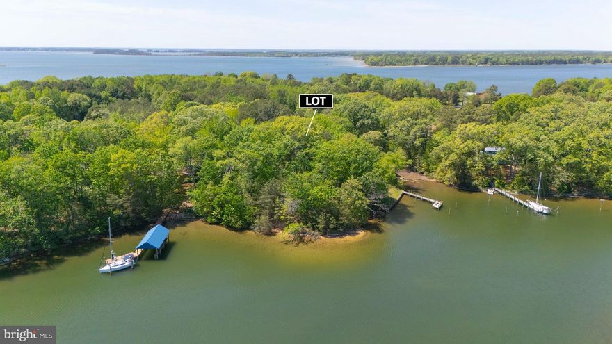 Discover the peaceful beauty of Lucas Cove on this 1.32-acre wooded waterfront lot located in historic St. Mary's County. This scenic retreat offers the perfect setting for nature lovers, weekend explorers, and waterway adventurers looking to own a piece of Southern Maryland's shoreline. Enjoy the private sand beach (tide dependent), shaded woodlands, and navigable waters ideal for power boats, kayaks, and deep enough for sailboats! The cove features natural oyster beds, tranquil waters, and abundant wildlife including ospreys, herons, and egrets. Perhaps the last raw, waterfront parcel in the highly sought after Rosecroft neighborhood. Enjoy it completely as-is or explore the potential possibility of installing your very own pier. *Please note, while the parcel is zoned residential, prior percolation tests failed for conventional & alternative septic systems.  No well exists. Not a building lot. Residential zoning may give option for a pier - buyer is responsible for due diligence. ** OFFER DEADLINE SET - FRIDAY 5/9, end of business!**