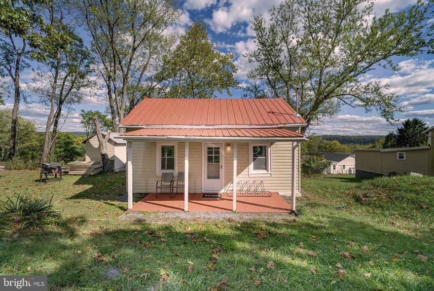 Charming Remodeled Home with Mountain Views | 32 Taliaferro St, Hancock, MD
A fully remodeled single-family home tucked away at the end of a quiet street in Hancock, MD. Perfect for those seeking privacy without sacrificing convenience, this 1-bedroom, 1-bathroom gem offers peaceful living just 2 minutes from Hancock Middle Senior High and Hancock Elementary School.
Originally built in 1970 and thoughtfully updated throughout, this 650 sq ft home sits on a 0.23-acre lot and features modern finishes and open-concept living. Step inside to discover a bright and spacious layout with new recessed lighting, fresh paint, and durable luxury vinyl plank flooring throughout. Laundry is on the main floor. The brand-new kitchen shines with updated cabinetry, countertops, and fixtures — seamlessly connected to the main living area, making it ideal for everyday living or entertaining.
The bathroom has been fully renovated with contemporary touches, and the generously sized bedroom offers plenty of comfort and natural light. New windows frame serene mountain views — a daily reminder of the peaceful surroundings you'll call home.
Whether you're a first-time buyer, downsizing, or looking for a low-maintenance retreat, this move-in ready property combines modern living with a scenic setting. Don’t miss this opportunity for affordable privacy with easy access to schools, town amenities, and nature.
Schedule your showing today!