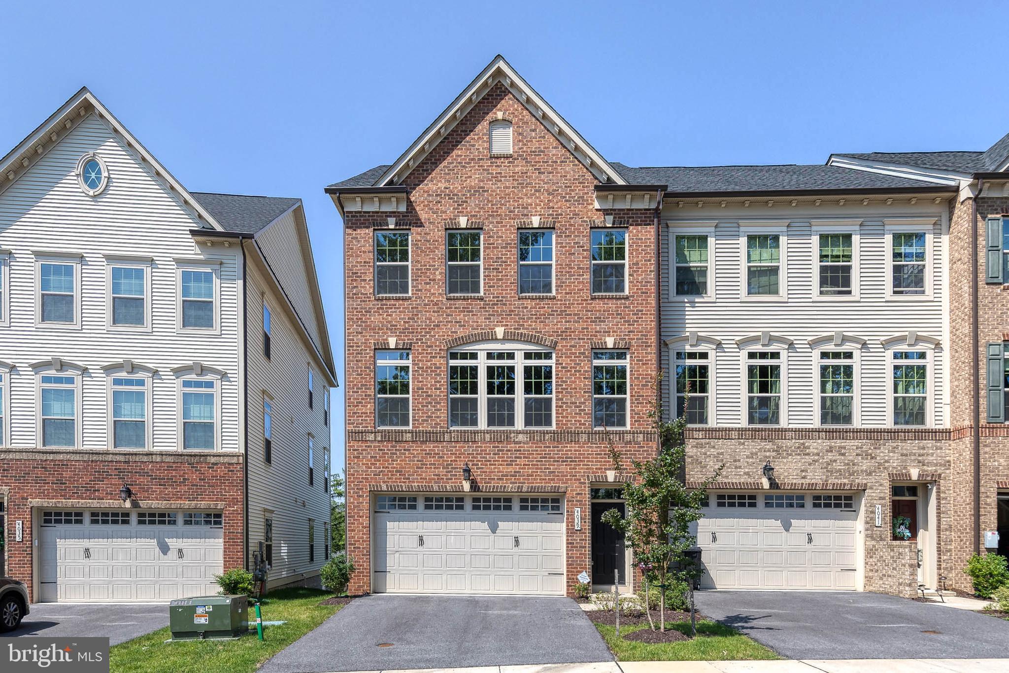 Live in Luxury – Modern Elegance Meets Everyday Comfort. Welcome to this nearly new end-unit home, showcasing premium upgrades and designer finishes throughout. From the moment you arrive, you’ll appreciate the convenience of the attached two-car garage—perfect for staying dry on rainy days. Step inside to an expansive main level that’s an entertainer’s dream. At the heart of the home is a show-stopping kitchen featuring a large center island with seating for five or more, crisp white shaker cabinetry, sleek matte black hardware, quartz countertops, a custom tile backsplash, and chef-grade stainless steel appliances—including a wall oven, built-in microwave, gas cooktop, range hood, and refrigerator. Luxury vinyl plank flooring in a neutral tone flows seamlessly throughout, while the bright white walls offer the perfect blank canvas for your personal style. The open-concept dining area comfortably accommodates a large table, ideal for hosting dinner parties or family gatherings. Just beyond, the spacious living room encourages effortless conversation and connection, with direct access to a low-maintenance Trex deck—perfect for summer BBQs and outdoor entertaining. Upstairs, retreat to an impressive primary suite featuring a tray ceiling, an abundance of closet space, and a wall of windows that flood the room with natural light. The luxurious en-suite bathroom offers a double vanity and a walk-in shower with a built-in bench. Two additional generously sized bedrooms share a stylish hall bath with a double sink and a convenient linen closet for extra storage. But the true showstopper is the lower level—a remarkably spacious bonus area with soaring ceilings that exceed those found in the rest of the home. Whether you envision a rec room, family lounge, game room, or all of the above, this versatile space is ready to impress.
Situated close to major commuter routes, top-rated dining, shopping, and more, this exceptional home blends modern sophistication with everyday convenience.
