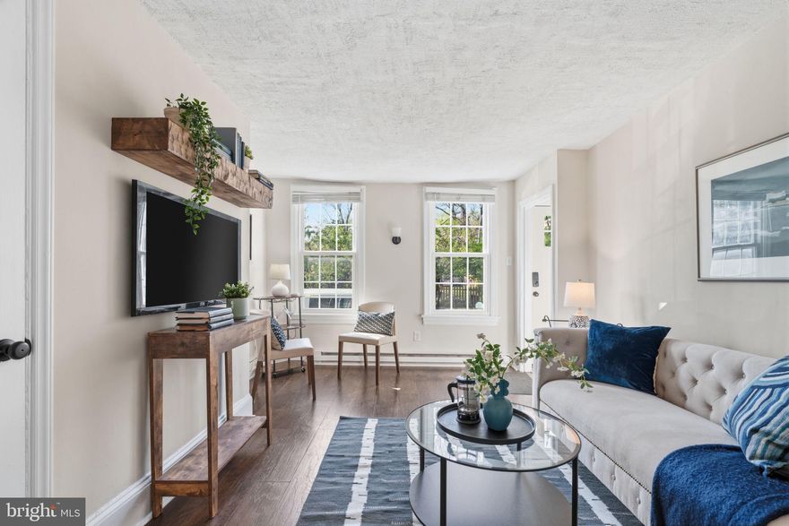 Welcome to 150 W Price Street!
Located on a quiet, tree-lined street in Germantown just one block from Vernon Park, this charming 2-bedroom, 1-bath townhouse blends classic character with modern updates. The sun-filled main level features new wide-plank laminate flooring and a spacious living room. The updated kitchen (2019) offers quartz countertops, gray cabinetry, stainless steel appliances, and a farmhouse sink. 
Step outside to a covered patio and a large backyard perfect for entertaining or relaxing summer evenings. A storage shed is an added convenience, a great addition for an avid gardener. 
Upstairs, the bright primary bedroom includes two closets, and the full bath has been beautifully updated. The second bedroom works perfectly as a guest room or home office.
Move-in ready , new roof installed 2023, and close to Wissahickon Valley Park, local shops, restaurants, SEPTA rail lines, and Germantown Ave , this home is a must-see!