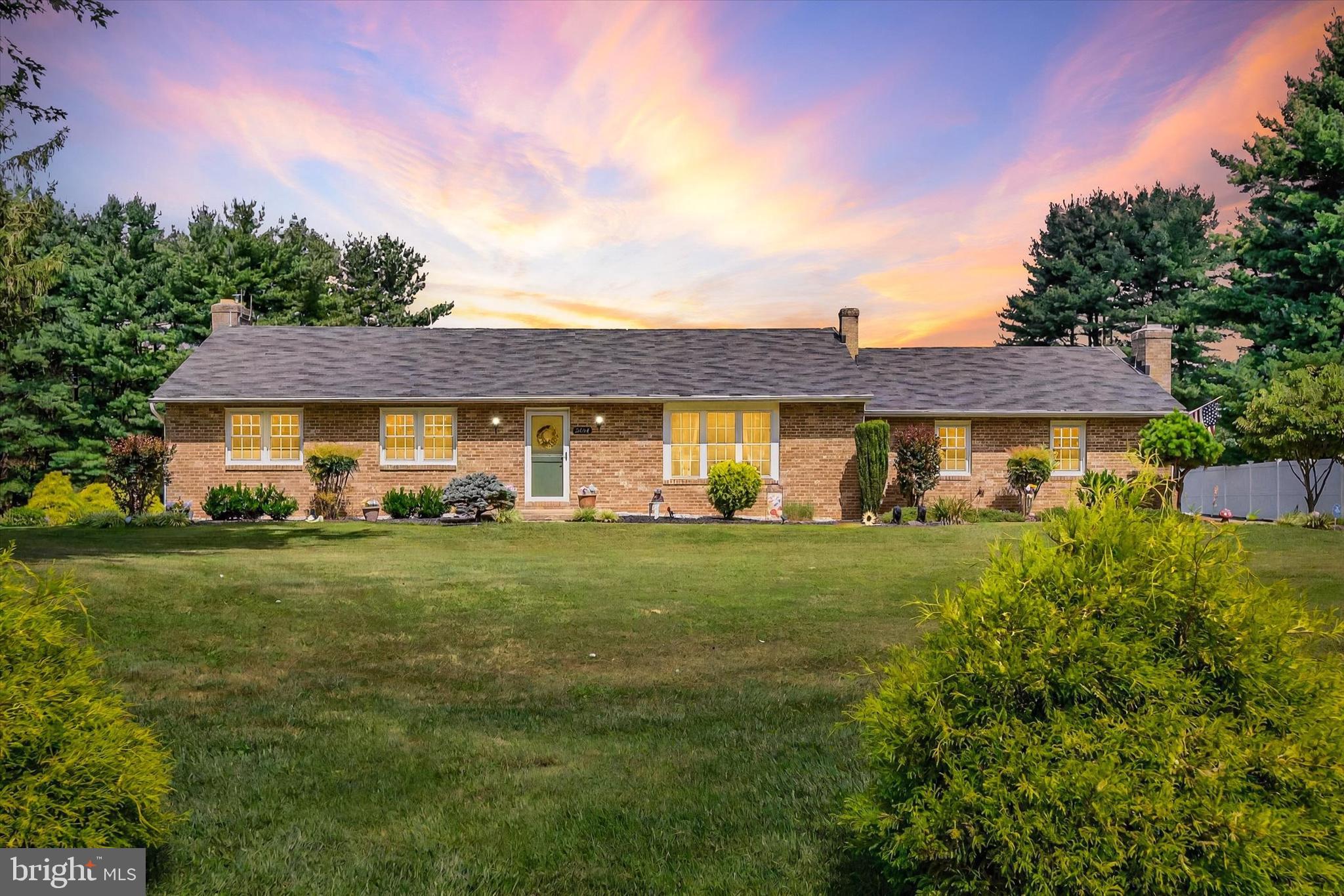 This charming ranch-style home located in rural Fallston offers a perfect blend of comfort and functionality. With 1.22 acres of lush greenery, enjoy serene views of the well landscaped yard and surrounding trees from your lovely sunroom, deck or patio off the detached garage. Inside, the open floor plan invites warmth, featuring a comfortable living area with wood-burning fireplaces on each level, ideal for gatherings. The kitchen seamlessly connects to the dining area and living room, equipped with a refrigerator, dishwasher, microwave, and electric oven. Three inviting bedrooms on the main level, along with a den currently set up as a guest bedroom provide ample space for relaxation. The primary suite boasts a walk-in closet and a full bathroom with a shower. Additional highlights include ceiling fans, hookup for a generator and a partially finished basement for extra storage or recreation. HWH replaced 03/25, roof on home is 13 yrs old with 50 yr shingles. Outside, you'll find an oversized one car detached garage with newer metal roof and a shed with electric, perfect for hobbies, doing chores or additional storage. With a paved driveway and plenty of parking, this home is ready to welcome you into a life of comfort and tranquility with space for entertaining in a rural setting, but convenient to major commuting routes, restaurants and shopping, APG, and Baltimore, Schedule a showing today and get ready to make this your new place!