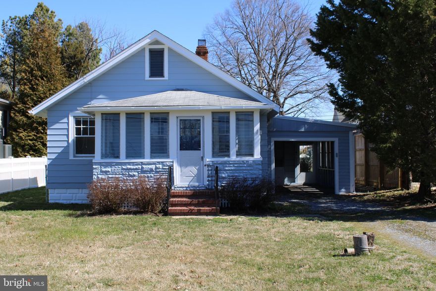 Enjoy the Beauty and Amenities of Bay Ridge. Modest Cottage 2 Bedrooms 1 Full Bath 1 Car Garage, Large Backyard, 3 Season Front Porch, Living room, & Dining Room. The Garage Measures 21 x 11. Pool Memberships are available.