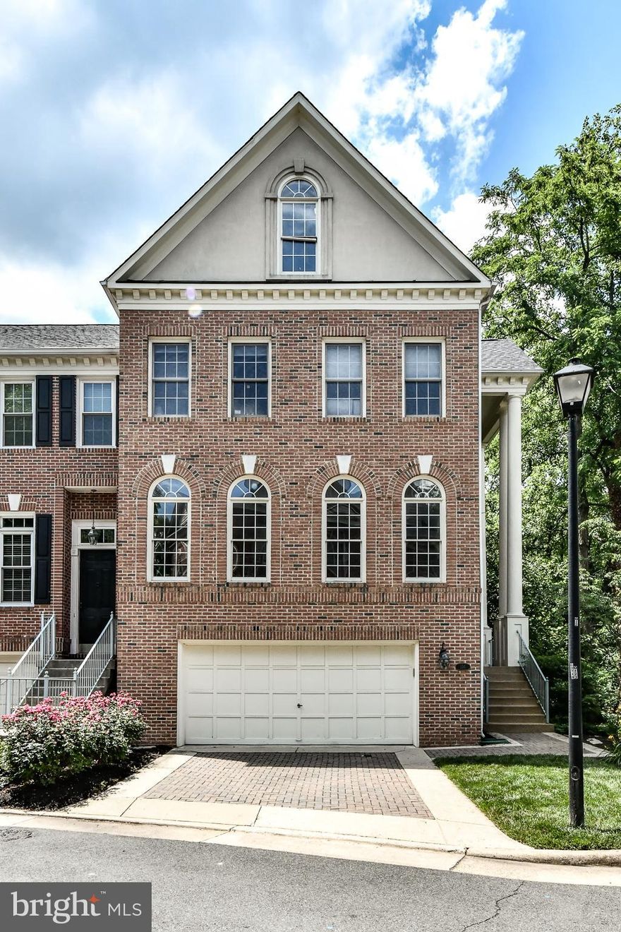 Exquisite 3BR, 3.5BA brick corner end-unit with 2-car garage*LUXURY living with the flow & spaciousness of a single family home*Upgrades at every corner of this home*Gorgeous hardwood floors main & upper level, neutral paint tones, recessed lighting & lots of natural light stream through this home*Palladian windows in the formal living room lead to dining area*Spacious Gourmet kitchen with rich cherry cabinetry, granite counters & stainless steel appliances with bay window in kitchen eatery*More Palladian windows in family room off kitchen with patio door leading to deck*Classy curved hardwood staircase leads to upper level bedrooms generously sized with ample closet space*Master suite boasts large, bright windows, cathedral ceilings & a spacious walk-in closet*Spa-like master suite bathroom with huge soaking tub, granite vanities, large frameless shower & tiled floors*Upper level bathrooms renovated with designer tiled floors & showers + granite vanities*Lower level is fully finished with marble floors, built-ins, a full bath off the rec room & marble floors with  patio doors leading to awesome covered 2nd deck outside, privately backing to trees*Parking is a breeze with your two car attached garage & additional storage space*The community also offers plenty of visitor parking spaces*Just steps to all of the restaurants and shops in the City of Falls Church*Convenient location for commuting, shopping & entertainment*Excellent commuters location*Less than 2 miles from East and West Falls Church Metro stations*Stellar Falls Church City schools! Light downtown within a short walk to everything yet private & quiet with beautiful nature views of park & creek on a private street*This home backs up to the peaceful Howard Herman Stream Valley Park*Conveniently located less than 3.5 miles from I495, I66, Rt 50, and Dulles Toll Rd

Available for lease 2.1.22*