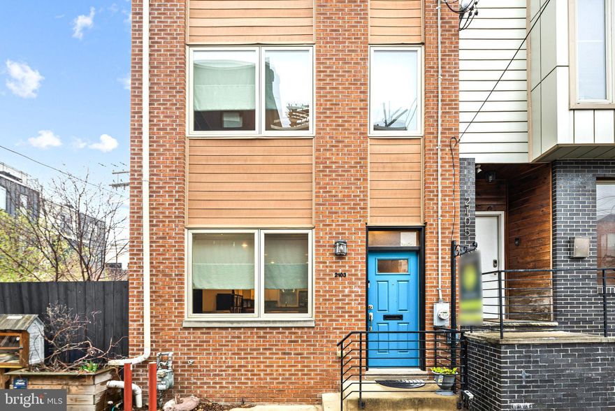 Nestled on a tranquil, charming street between Front Street and Frankford Avenue, 2103 Abigail Street is a meticulously maintained, 18-foot-wide townhouse that seamlessly blends contemporary design with thoughtful upgrades. Constructed in 2015, this residence offers approximately 2,200 square feet of living space, encompassing three spacious bedrooms, two and a half bathrooms, and a finished basement. Upon entering the home, you'll immediately notice the light wide plank hardwood floors, and the extra-wide living room with high ceilings, where natural light pours in from the front windows. The living room expands into the back of the first floor, where the chef’s kitchen stands as a centerpiece. Featuring darker granite countertops, soft close white shaker-style cabinetry, stainless steel appliances, and gas cooking, the kitchen is further enhanced by a unique dual skylight feature that bathes the space in natural light. It leads out to a smaller outdoor patio, ideal for grilling or container gardening. Downstairs, the fully finished basement offers tons of storage and is finished with large-format tile and a striking feature wall adorned with gorgeous floral accent wallpaper. A stacked laundry closet and a half bathroom round out this level. The second floor includes two spacious bedrooms and a full bathroom. The middle secondary bathroom is a fun surprise, with a Star Wars-themed accent wall, classic subway tile, and a soaking tub with a single vanity. The third floor is dedicated to a luxurious primary suite, offering a private sanctuary with a spacious primary bedroom and large bathroom. The primary bathroom is a true retreat, featuring double floating sinks, a water closet with linen storage, and a modern shower with incredibly high ceilings. The shower is designed with stacked black subway tiles, a rain showerhead, chrome accents, and a glass stall. The home’s showpiece is the expansive rooftop deck, which offers gorgeous, unobstructed city views. It is perfect for entertaining or simply relaxing in your urban oasis. Situated on a smaller, community-friendly street, this home often serves as a play area during summer months, fostering a close-knit neighborhood atmosphere. Its prime location places you within walking distance of Fishtown's most coveted spots, including acclaimed establishments like Suraya, Laser Wolf, ReAnimator Coffee, and the Berks Street El Station, ensuring an effortless commute. The East Kensington neighborhood, rich in history and culture, offers a vibrant community atmosphere. Adjacent to Fishtown, known for its eclectic mix of culinary delights and entertainment venues, residents can enjoy a dynamic urban lifestyle. The area features a variety of local amenities, dining options, and public transportation, making it a desirable location for those seeking both convenience and a lively community. With significant development underway, this is a prime opportunity to own property in a rapidly growing neighborhood.***SHOWINGS START 1st OPEN HOUSE (4/12)***